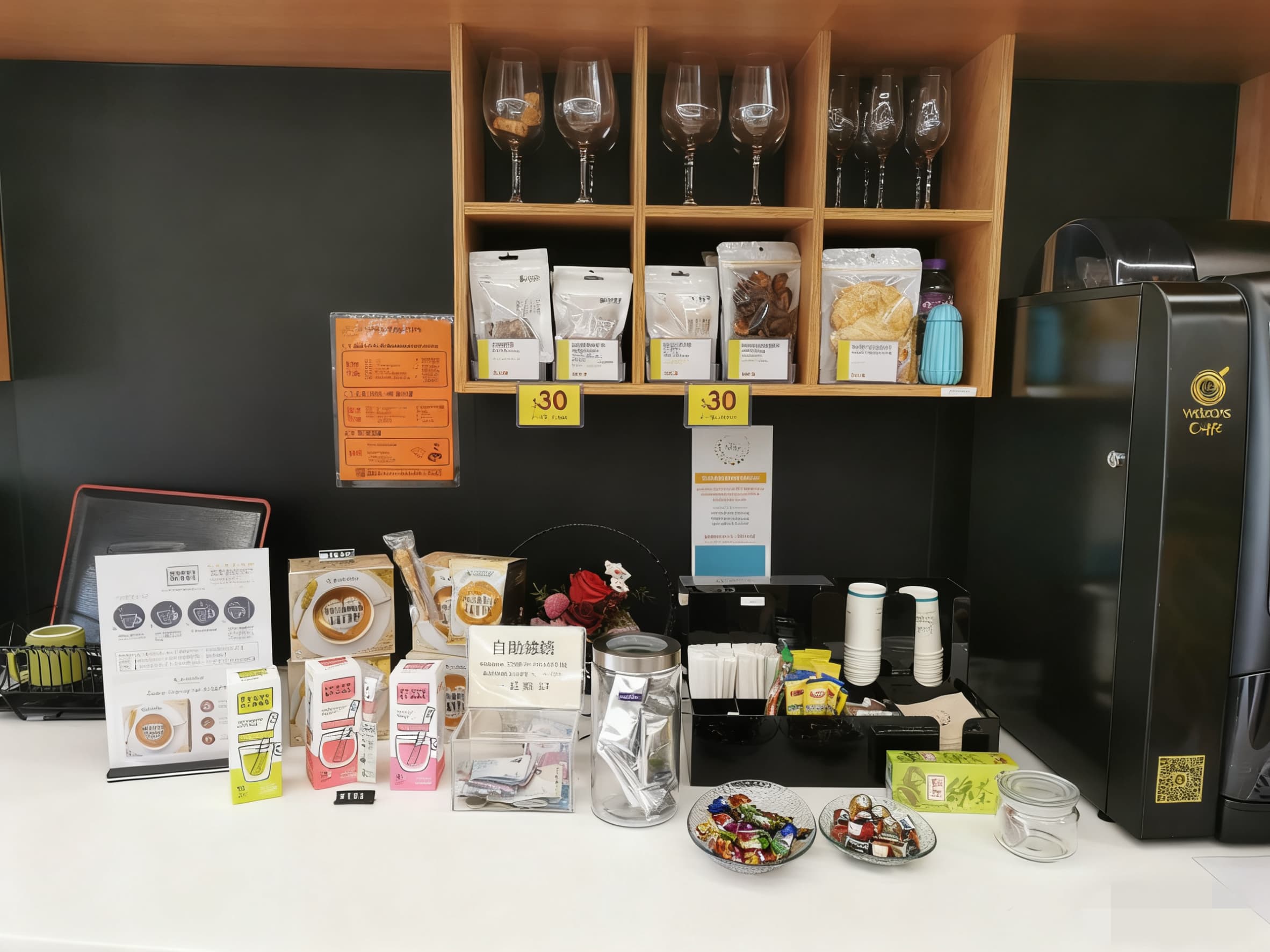 Common Area Pantry; Self-service cups, bowls, and plates. Complimentary drinking water, tea, and coffee provided.