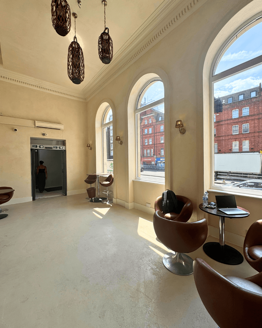 Client lounge with leather seating & natural light. SSV Suites, Finchley Road NW3, North London.