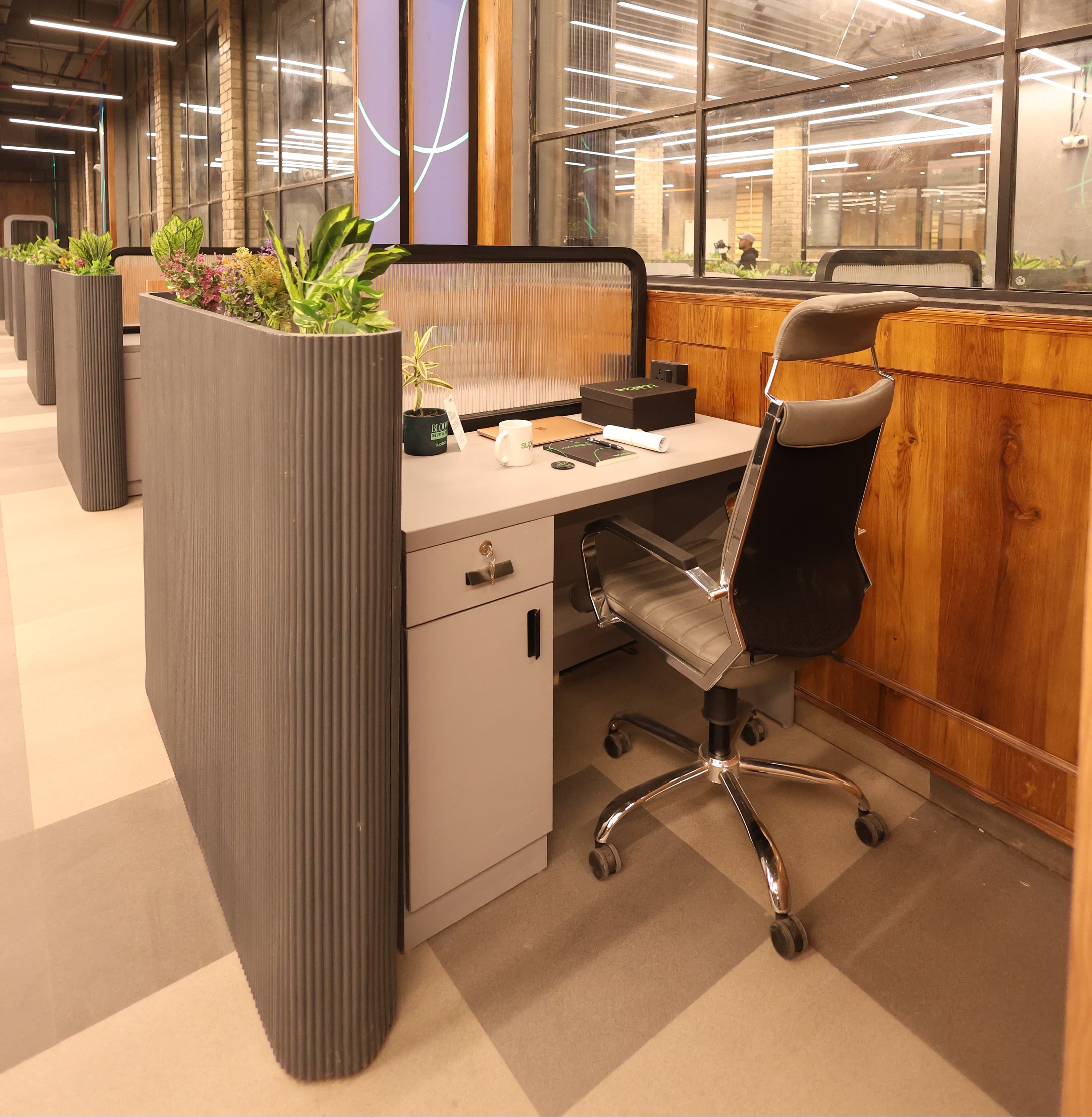 Superco – S1 Workspace showcasing private desks with flexible daily, weekly, and monthly pricing per seat.