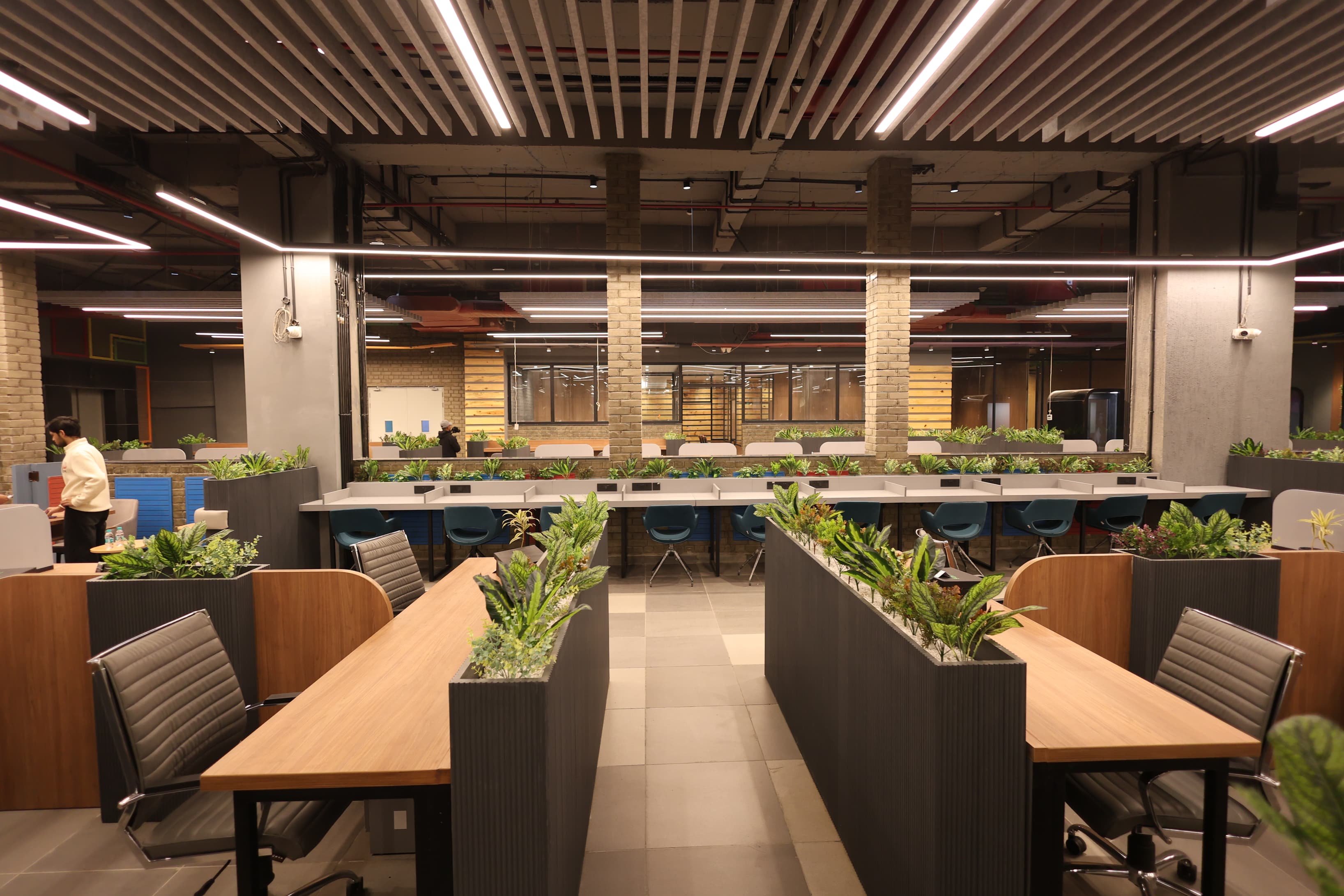 Superco – S2 Workspace showcasing four seating arrangements: Super seats, work desks, private desks, and lounge seats.