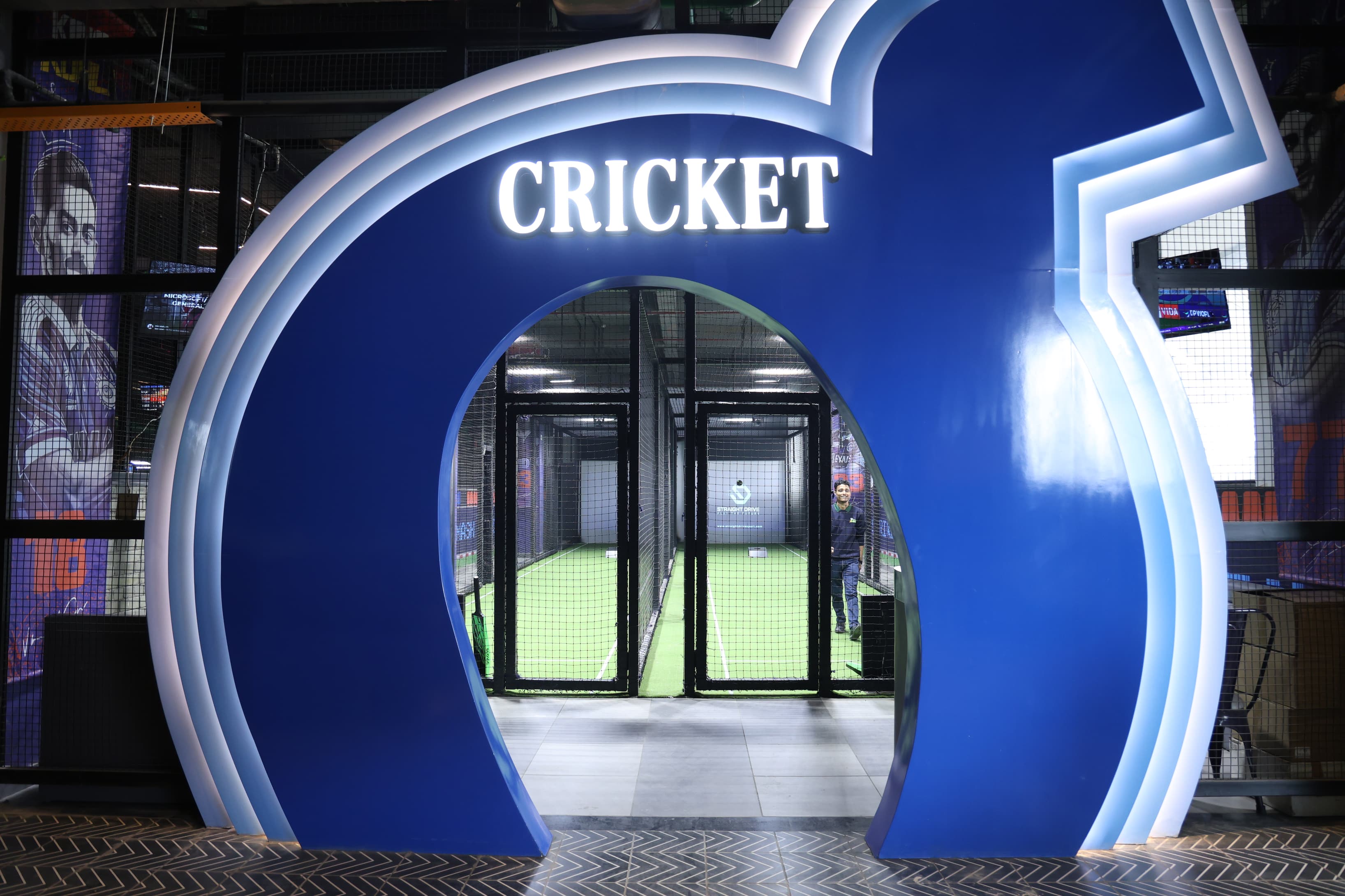 Superco Game Zone featuring an indoor cricket setup for quick breaks and team play.