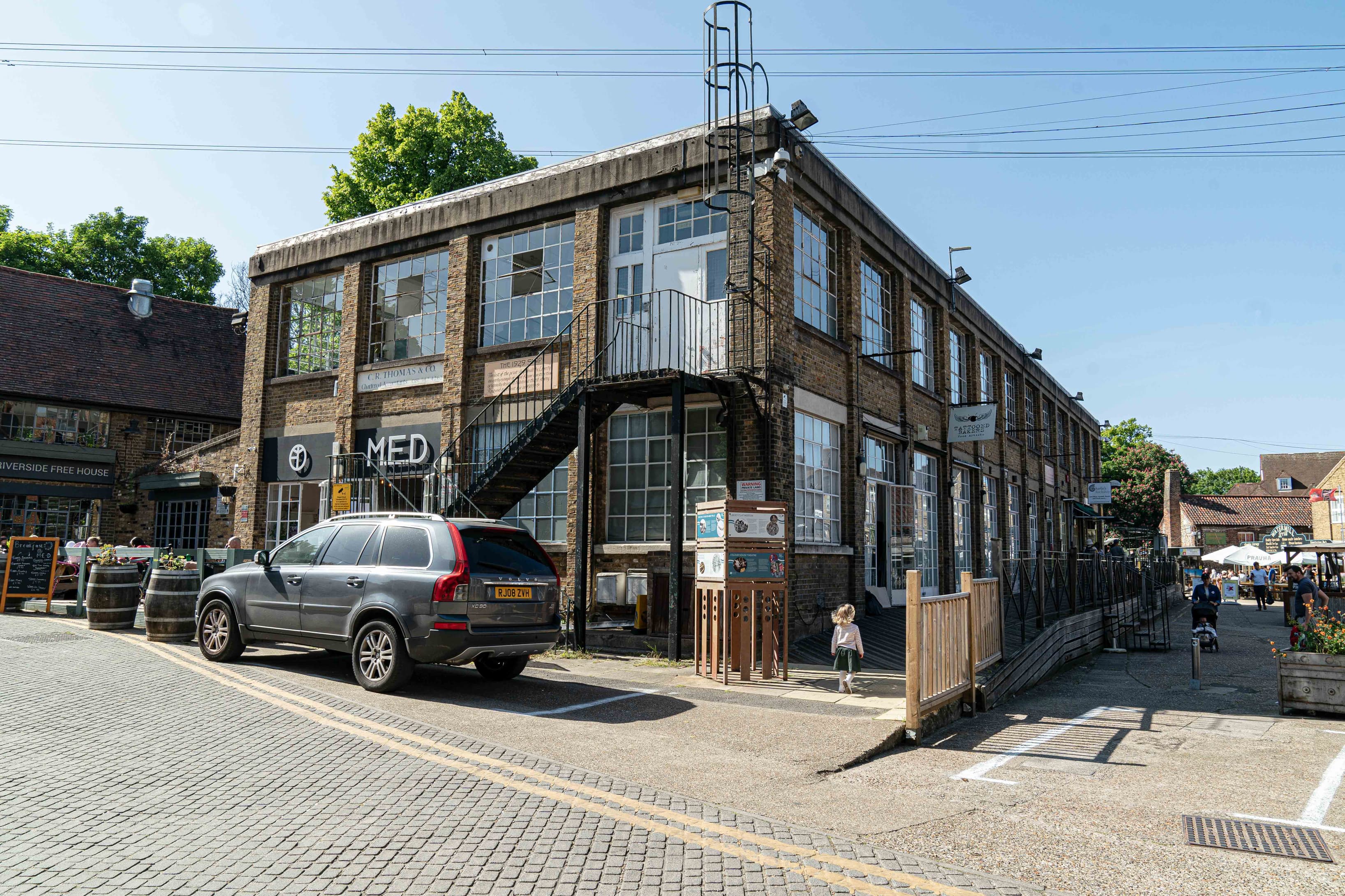 Converted textile mill on the banks of the river wandle