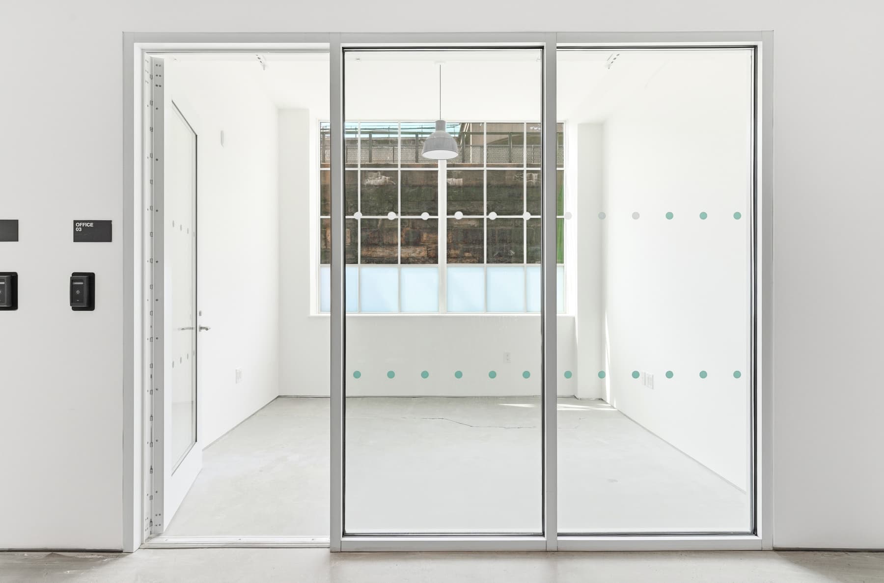 12x12 private office with glass front and natural light. Desk and chair included. 12x12 private office with glass front and natural light. Desk and chair included.