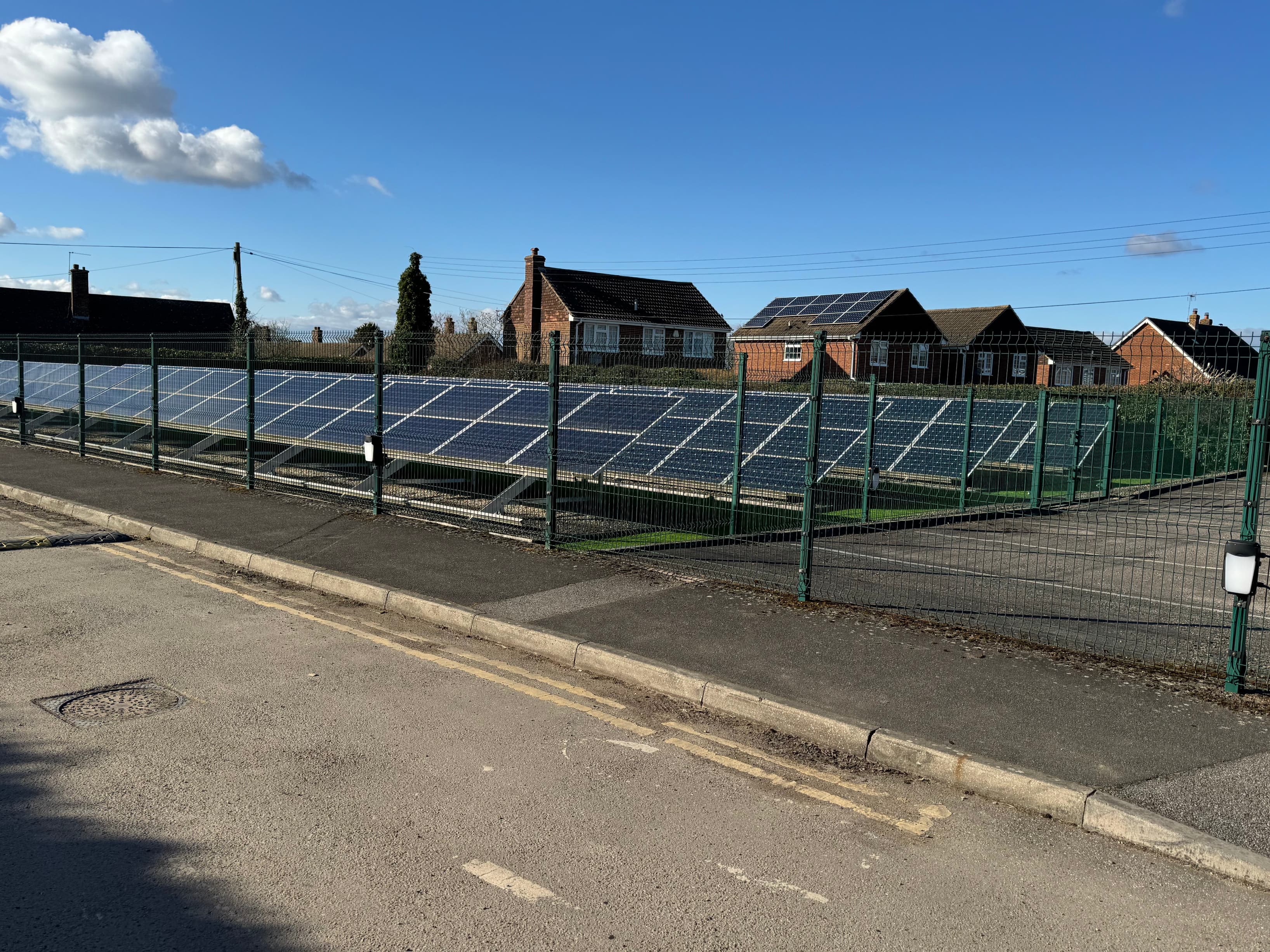 Large solar farm provides power to the building.