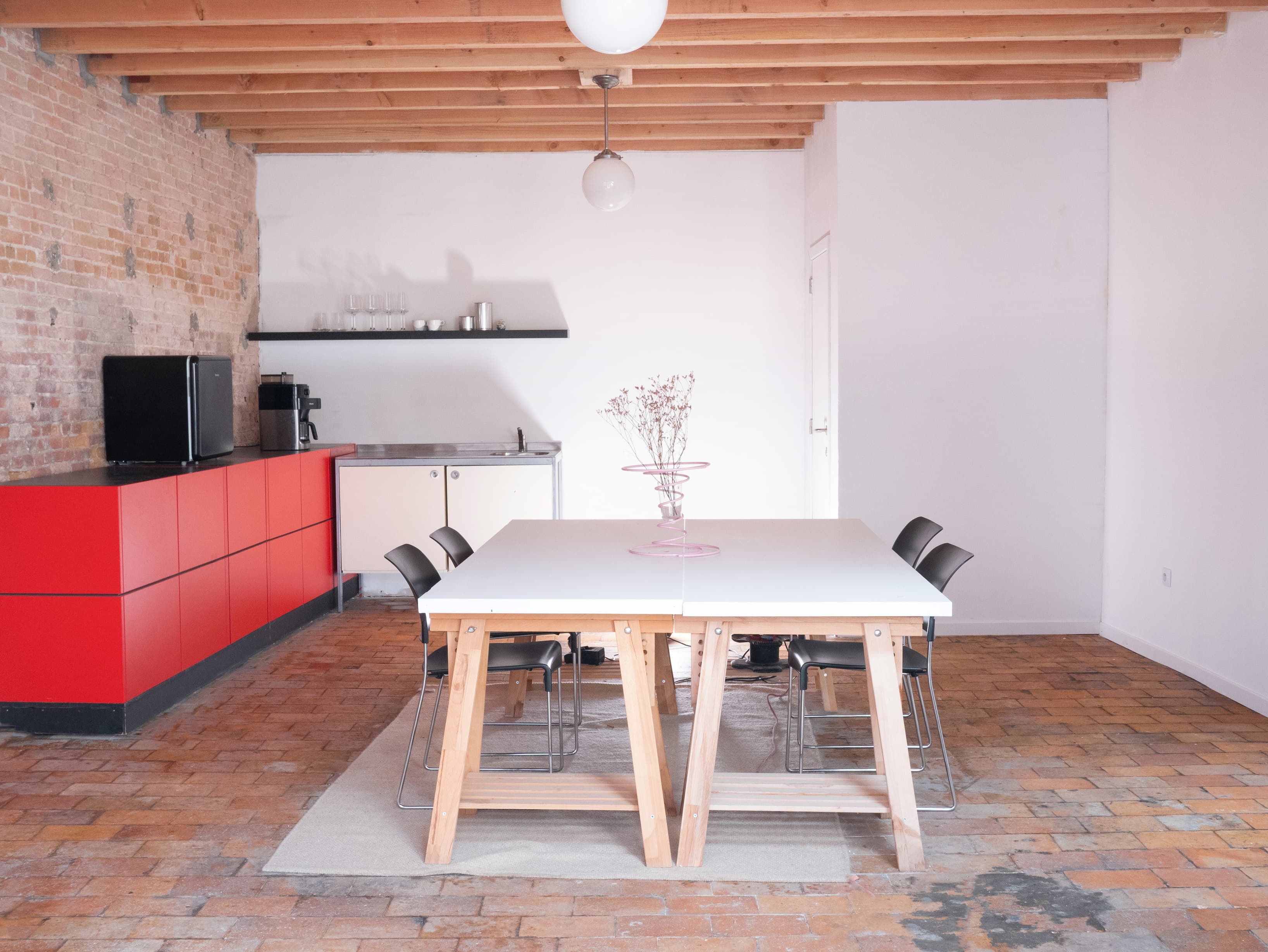 The conference room and kitchen
