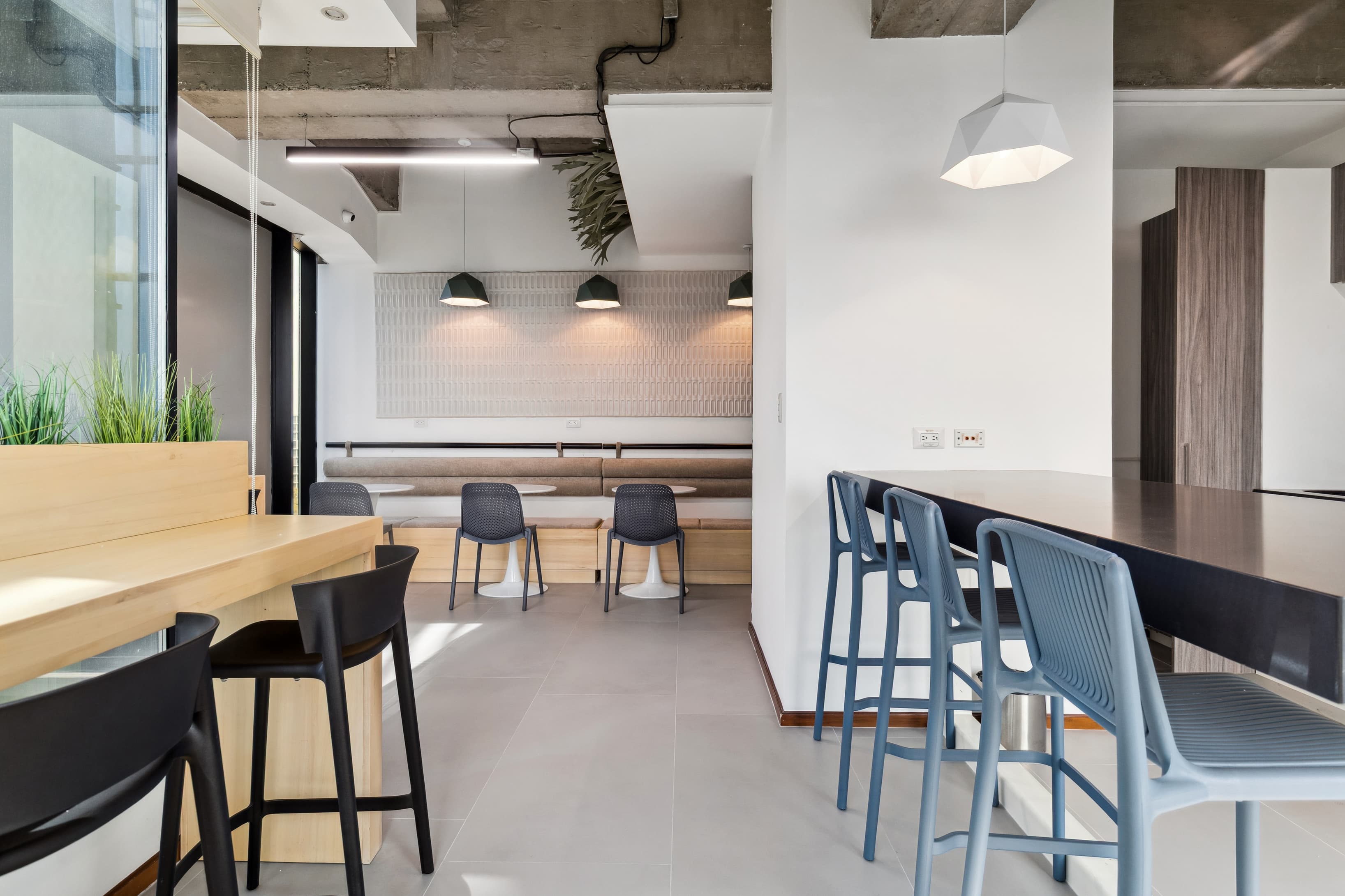 Shared lounge and coworking area with flexible seating.