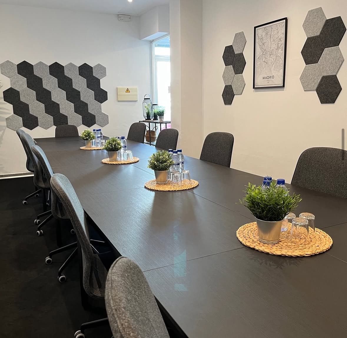 Large conference table prepared for meetings and workshops