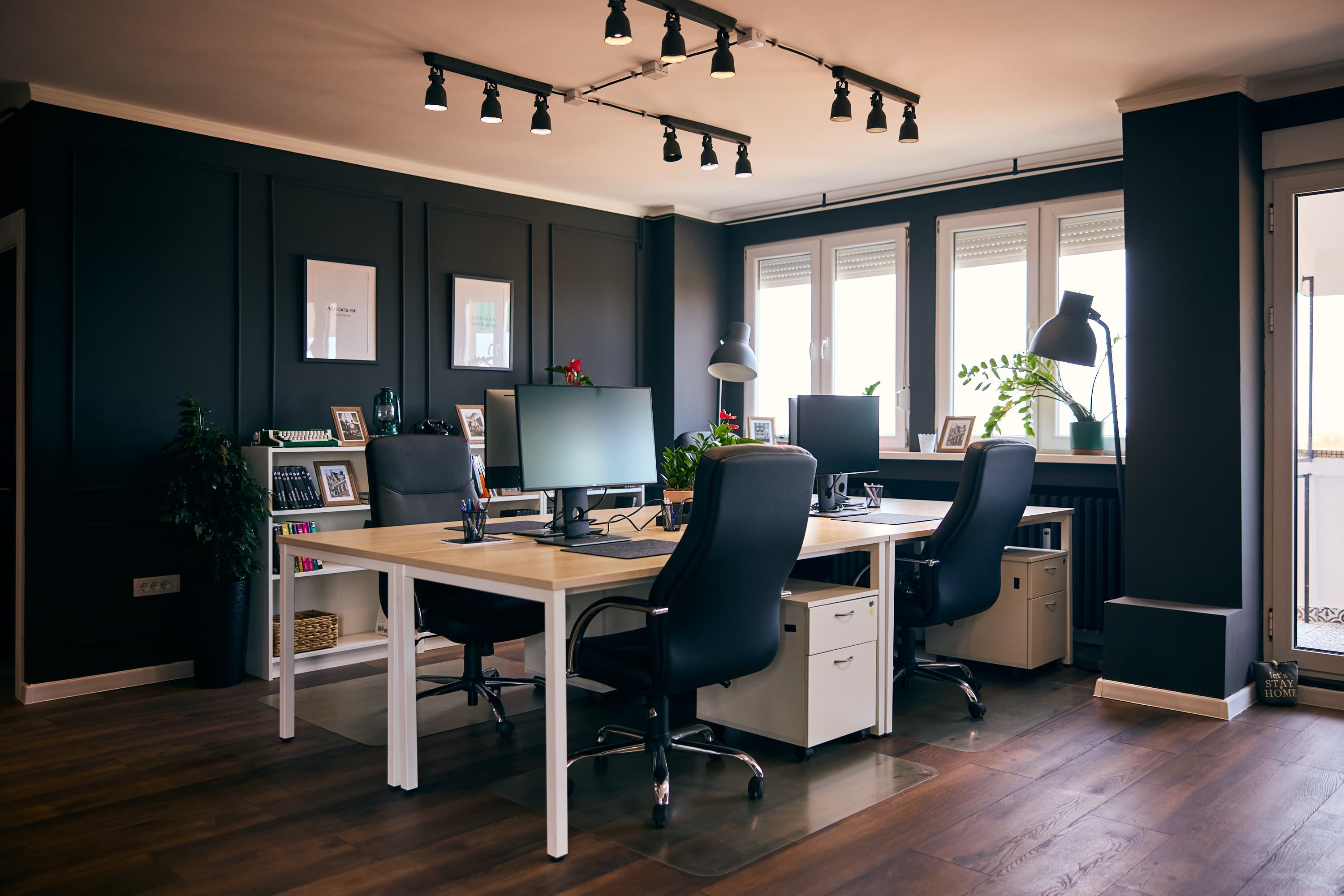 Modern desk setup, fast Wi-Fi, natural light, and a calm atmosphere — your personal productivity zone within our shared space