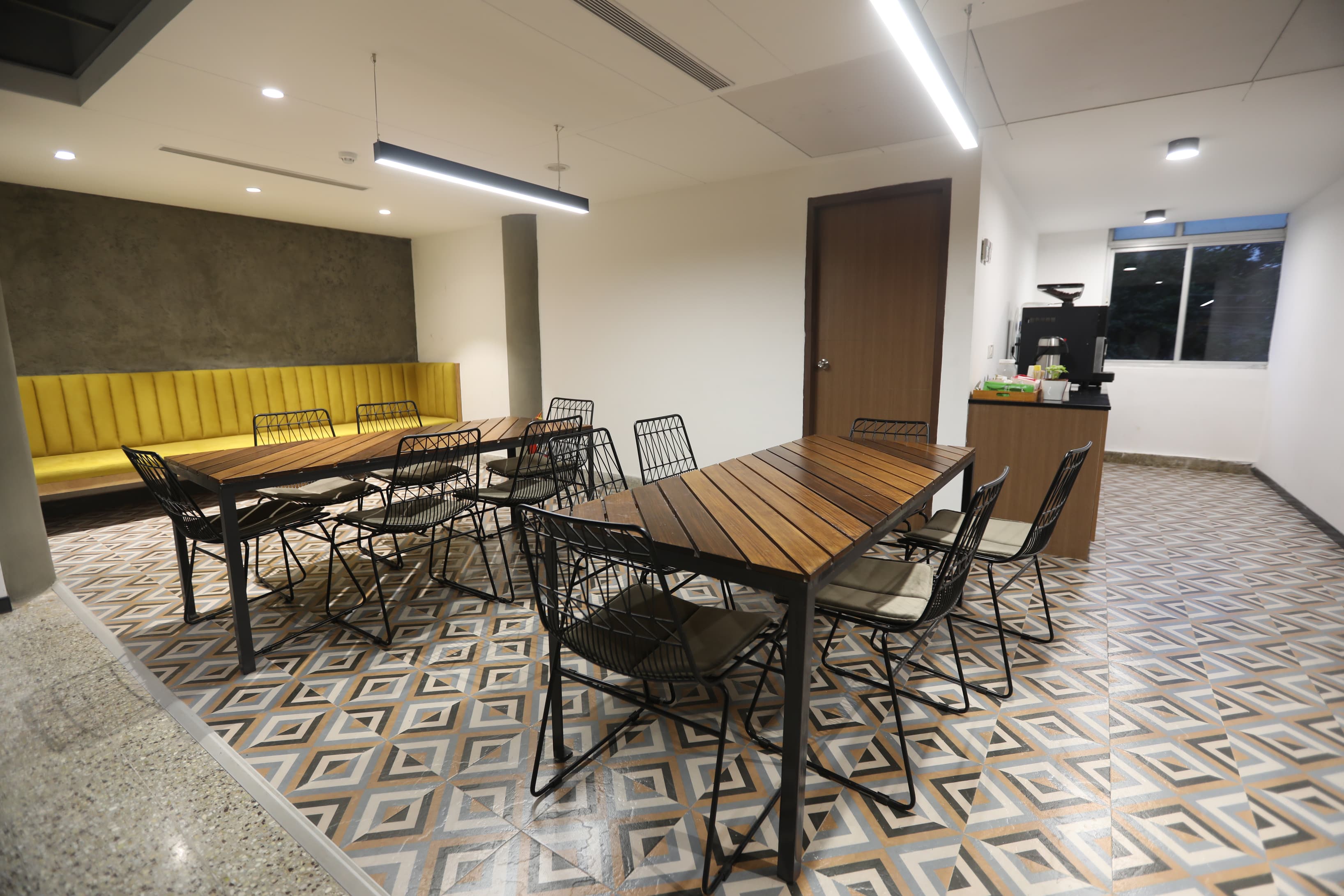 The use of natural materials like wooden tables creates a warm and eco-friendly ambiance.