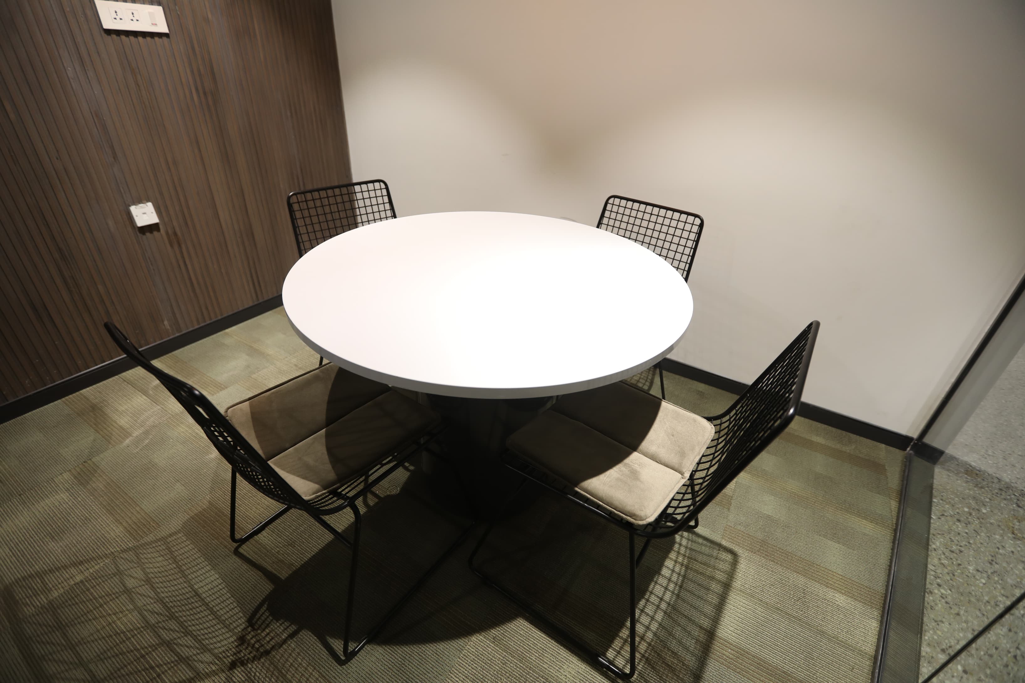 The desks are spacious, allowing for an uncluttered and efficient work setup,