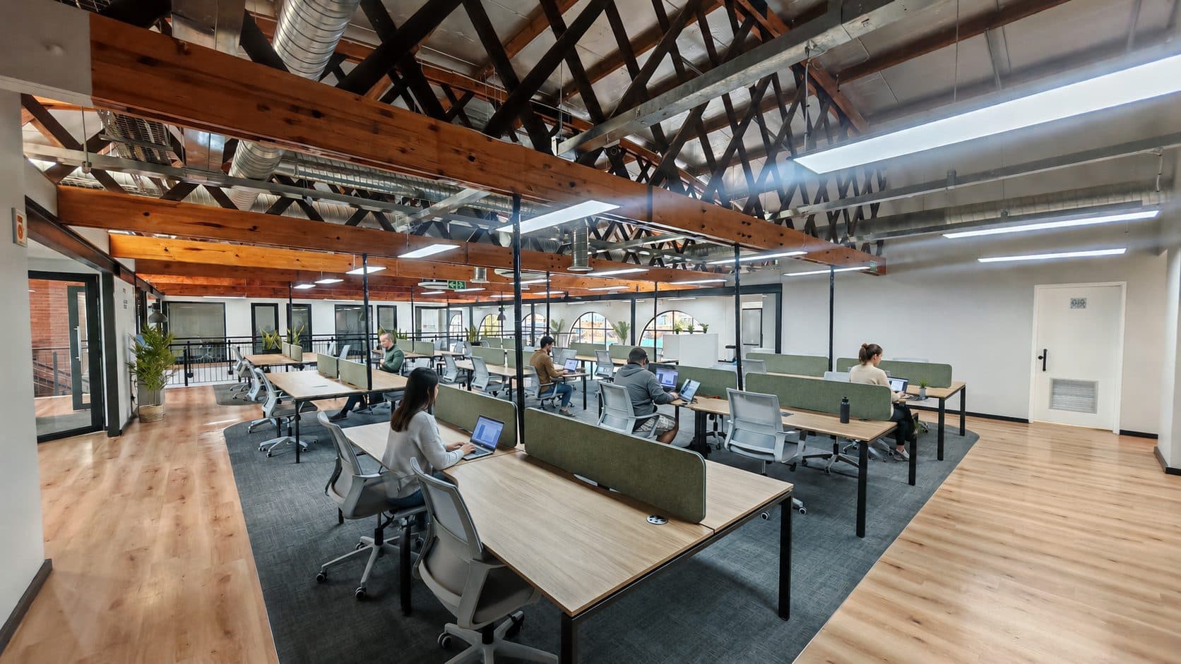 Hot desks in the open coworking space