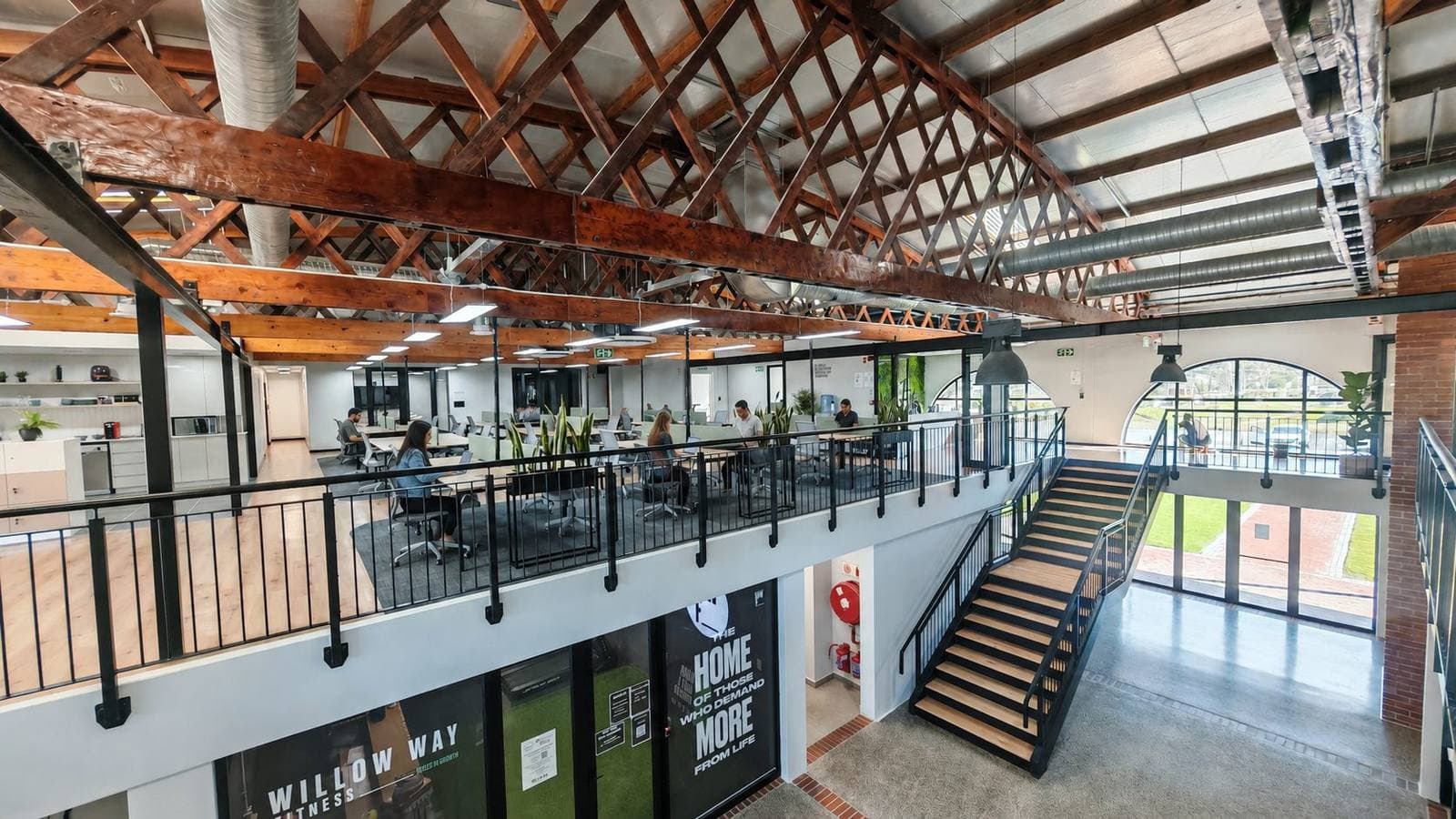 Open work area with mezzanine and natural light
