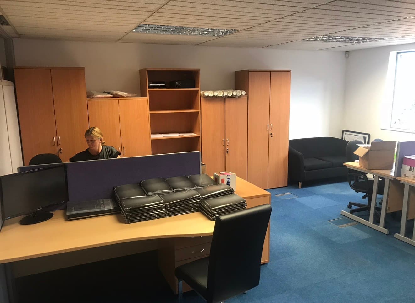 2-4 person office space with ample seating and storage 