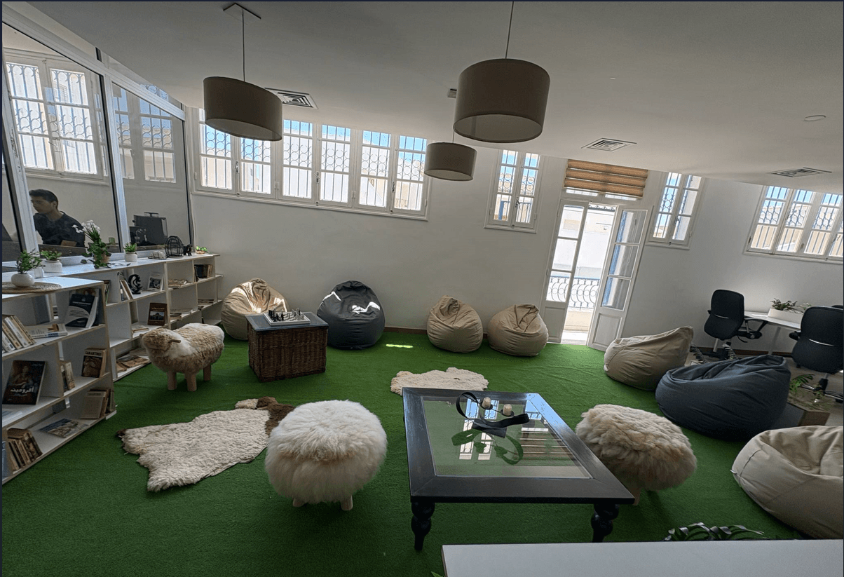 A cozy space with bean bags and plants—perfect for breaks, chats, or laid-back brainstorming sessions.