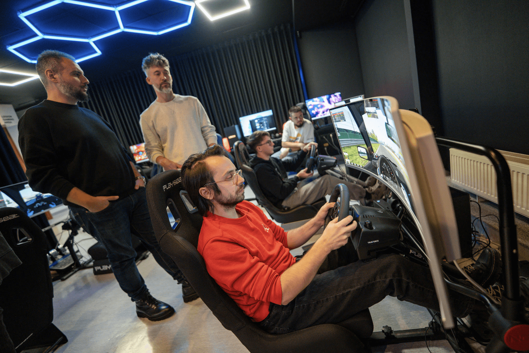 Sim racing is a great team activity. Sim racing is a great team activity.