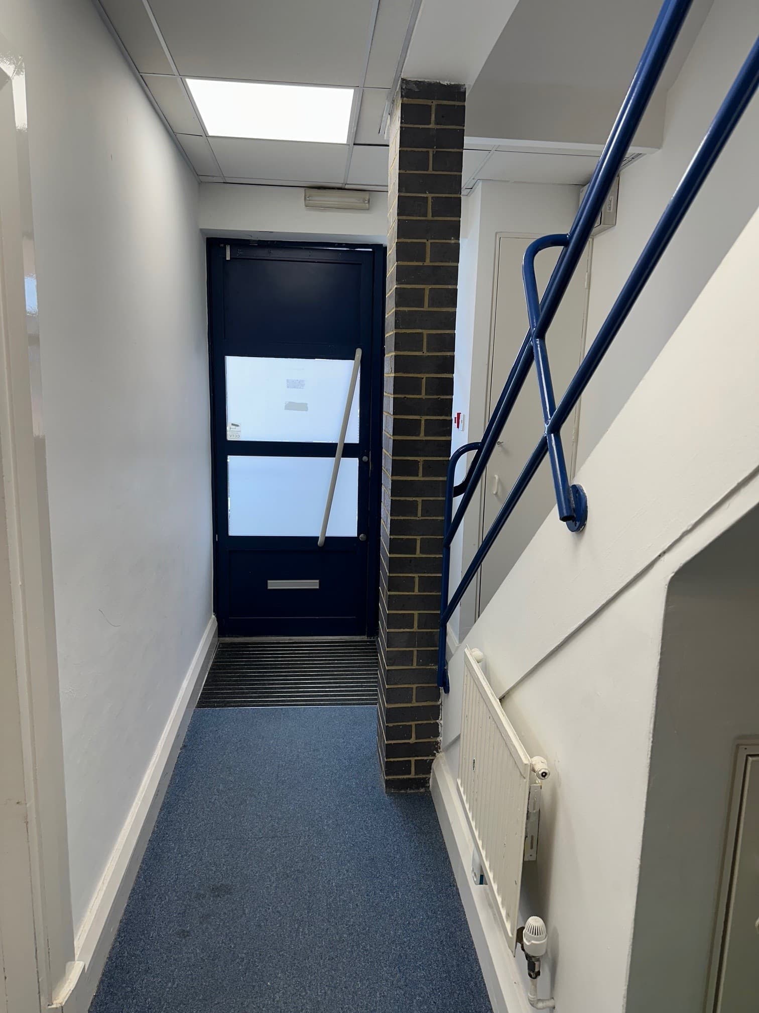 Hallway to entrance door 