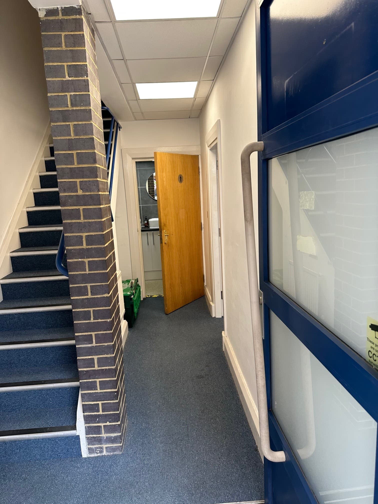 Inside entrance to ground floor office an WC