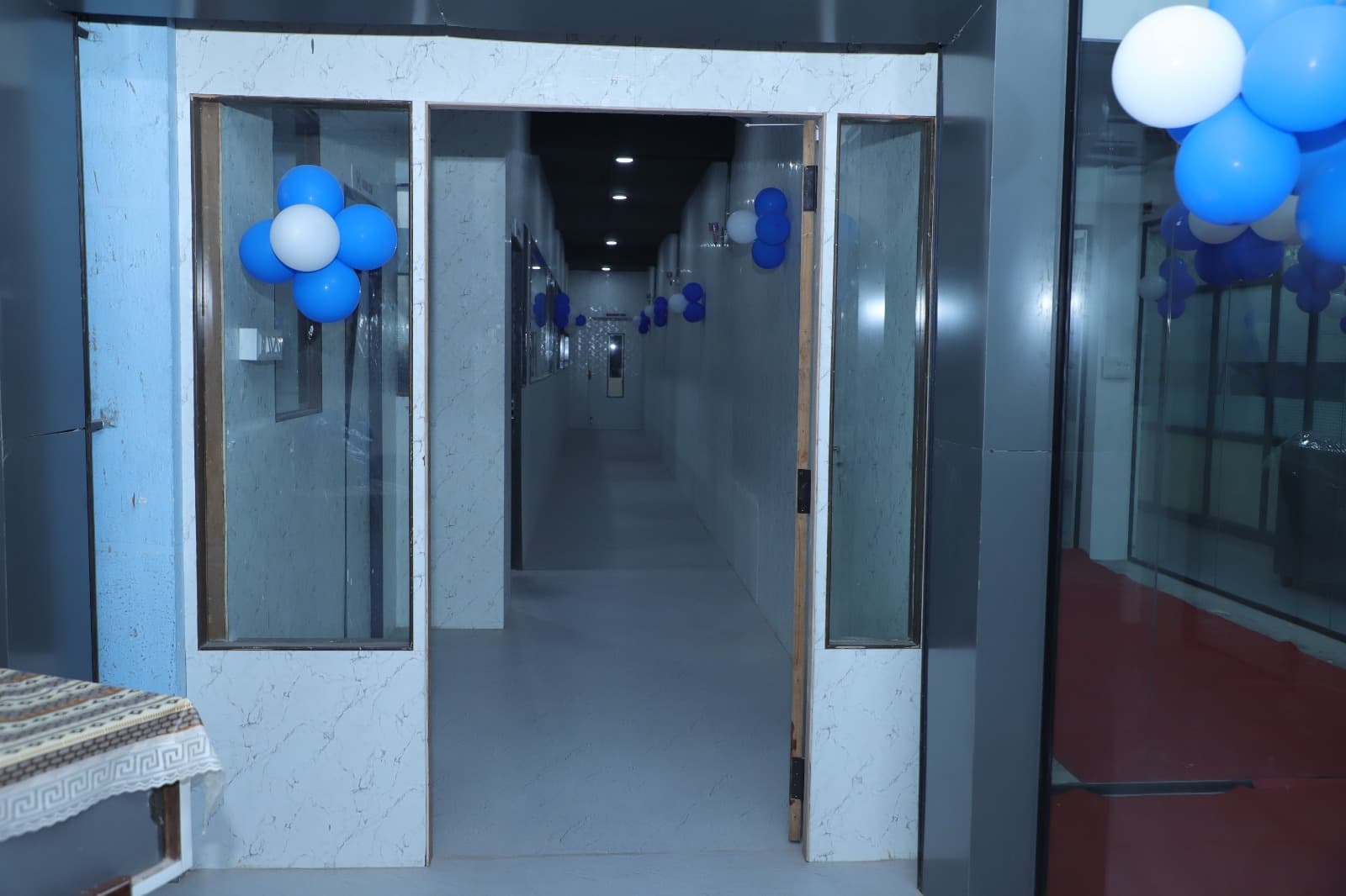 Spacious and well-lit corridor connecting private cabins and workspaces at Universe Coworks Trichy — designed for easy moveme Spacious and well-lit corridor connecting private cabins and workspaces at Universe Coworks Trichy — designed for easy moveme