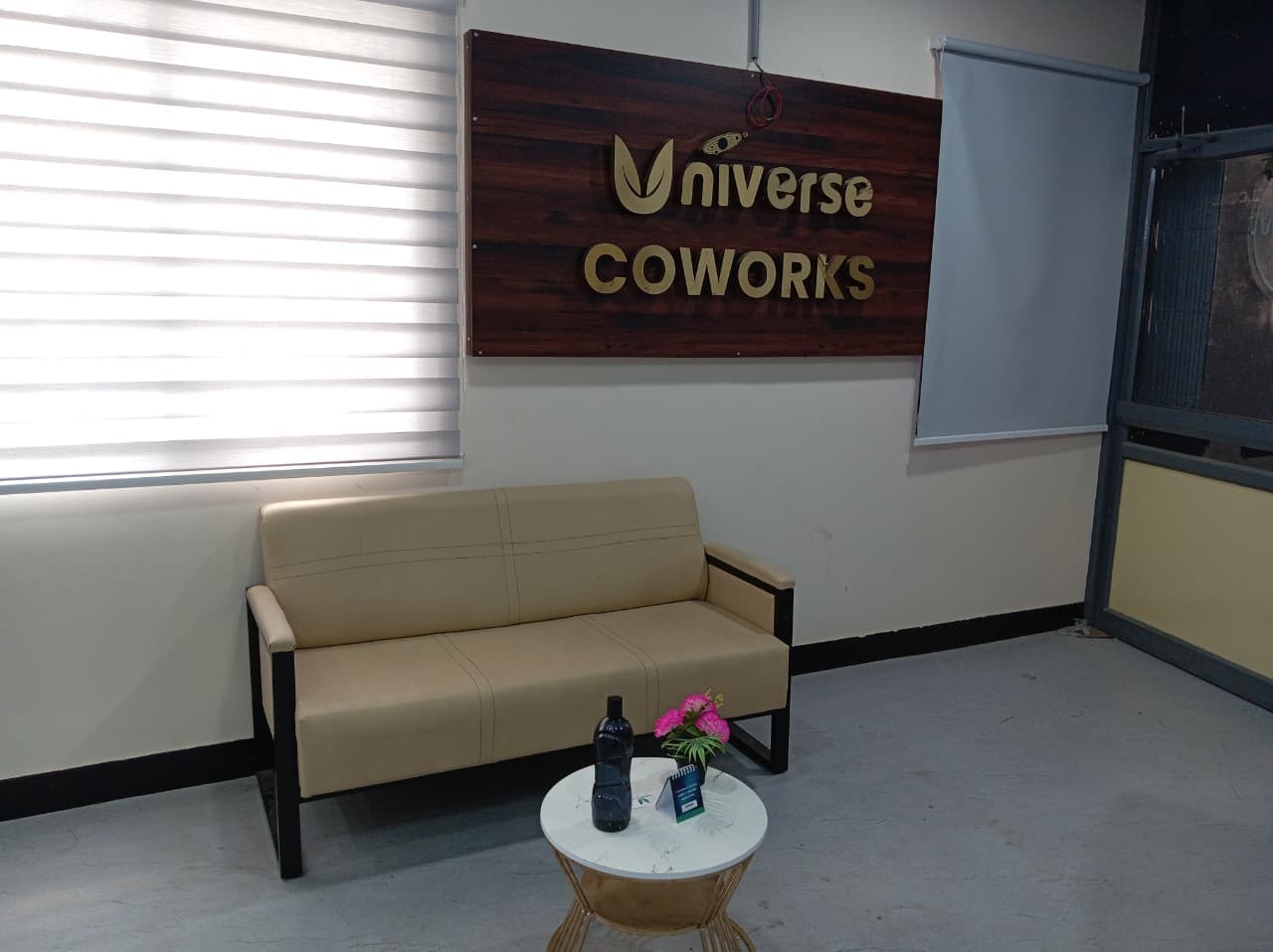 Clean and modern reception lounge at Universe Coworks — featuring premium leather seating, natural lighting, and our signatur Clean and modern reception lounge at Universe Coworks — featuring premium leather seating, natural lighting, and our signatur