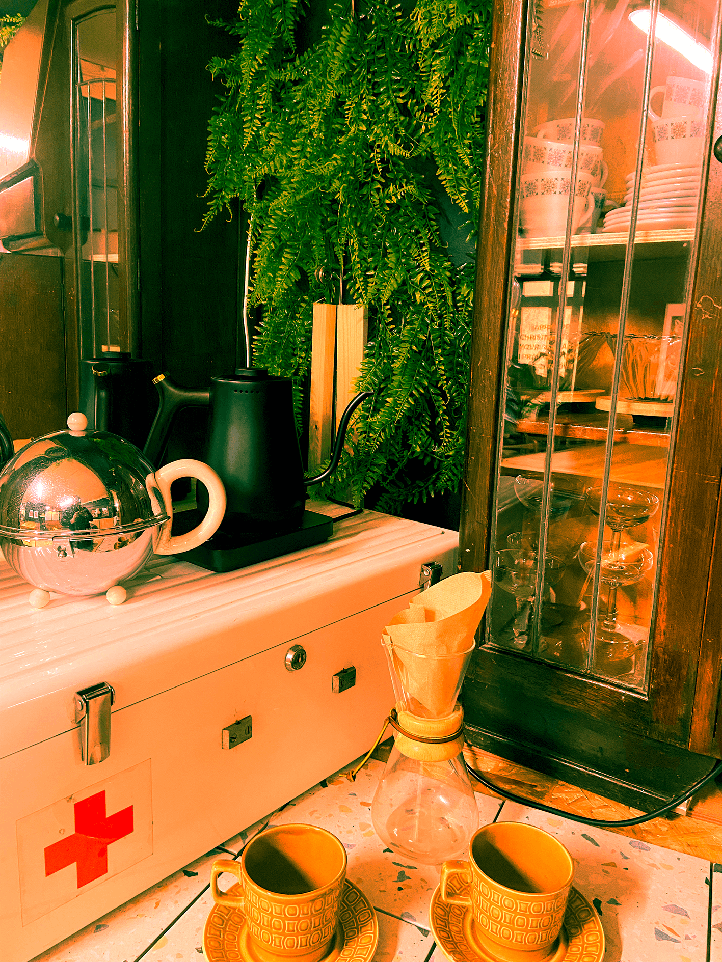 Tea and coffee making facilities with vintage tea sets, and many options for coffee making