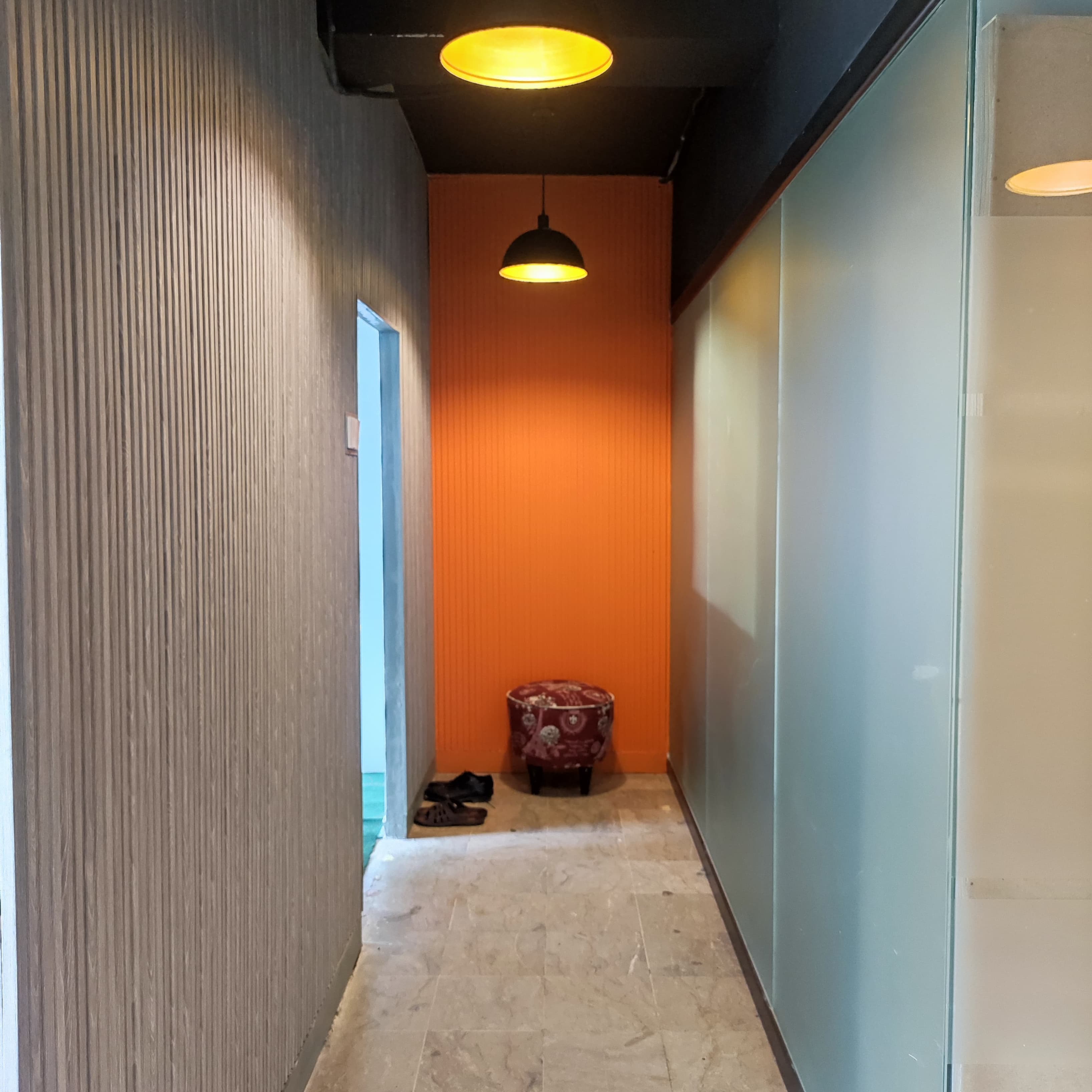 A quiet corridor guiding toward the prayer room, designed for reflection and peace. A quiet corridor guiding toward the prayer room, designed for reflection and peace.