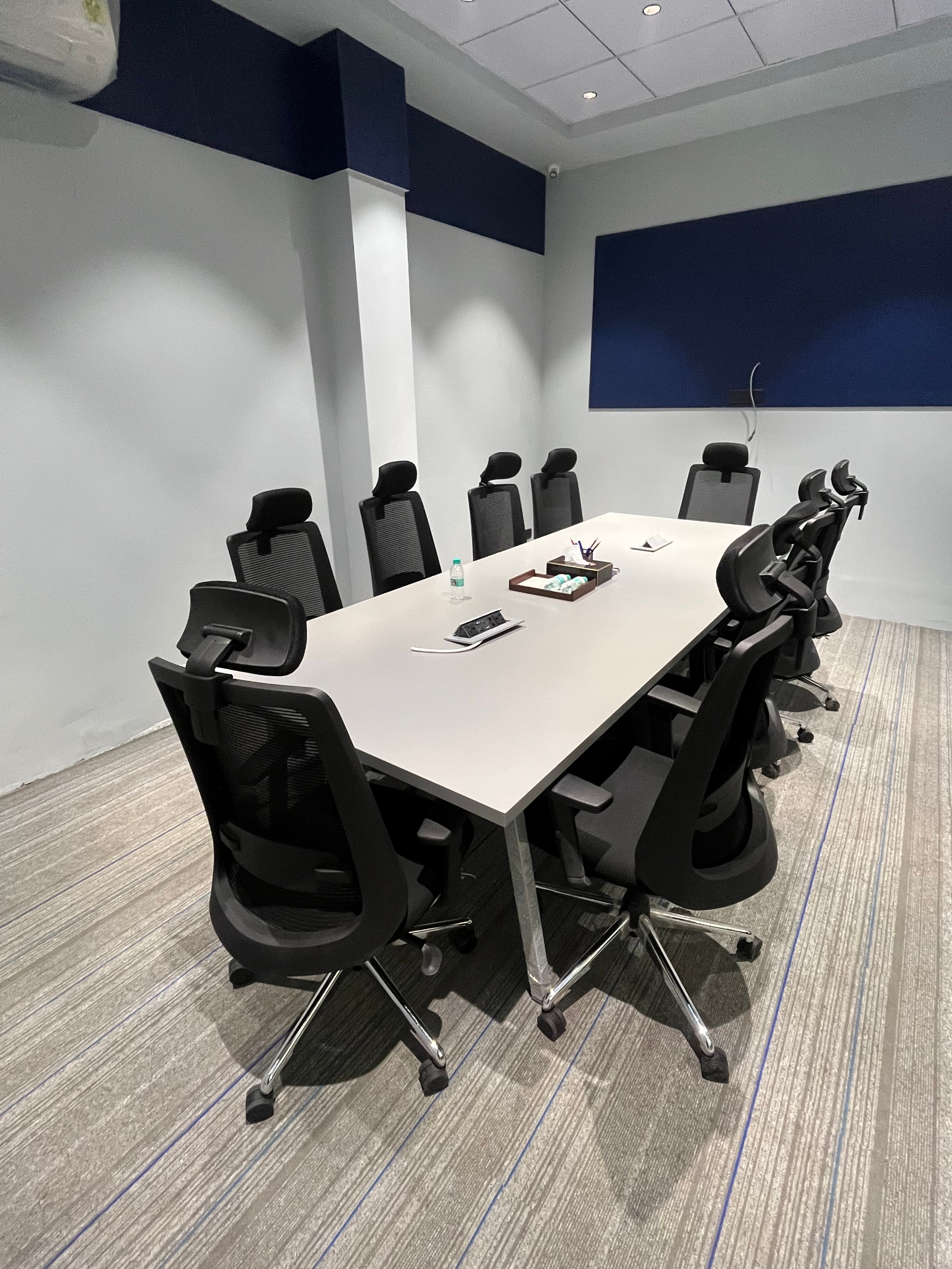  A modern and thoughtfully designed conference room at Thryve Coworking.