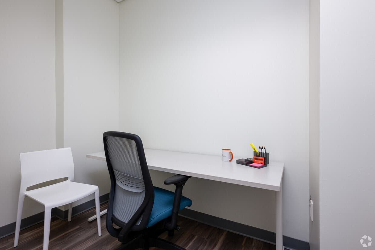 Dedicated Desk in quiet corner of suite