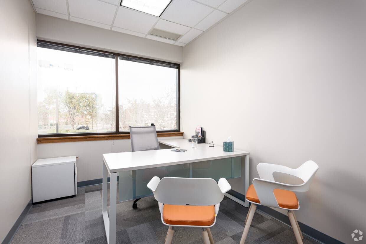 Window office with L-shape desk