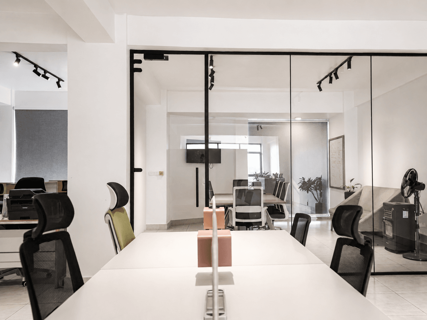 Relax & work without the cramped feeling. Cluster desks, good lighting, and a calm focused atmosphere throughout.