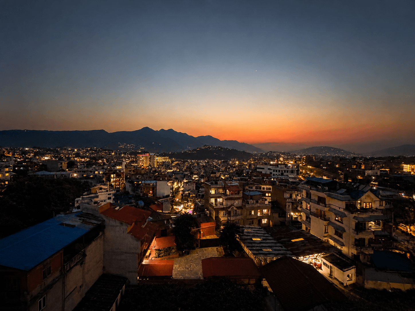 Watch Kathmandu light up at sunset from our space. This view comes standard with every membership.