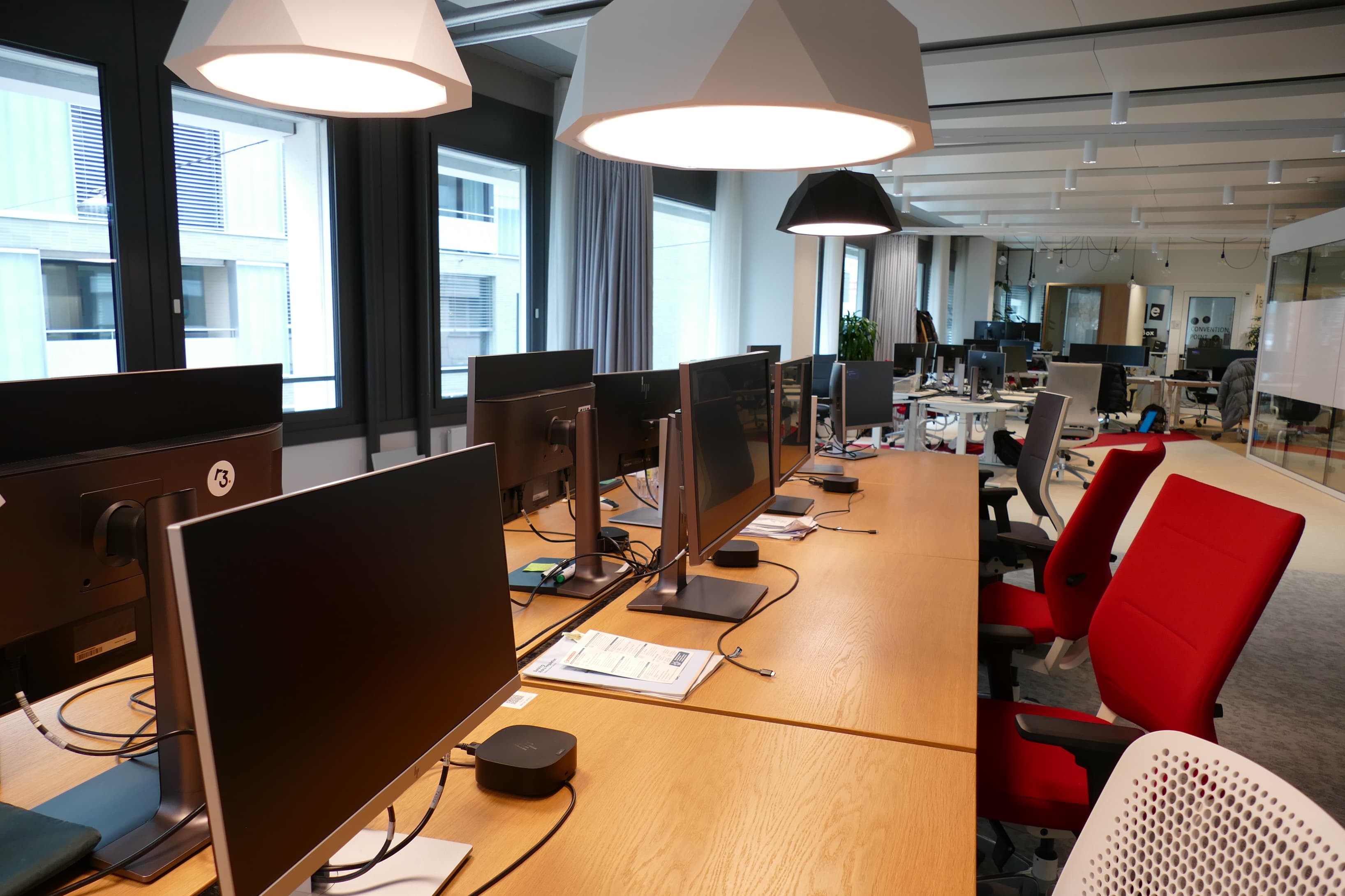 Ergonomic workstations with external monitors, high-speed internet and standing desks.
