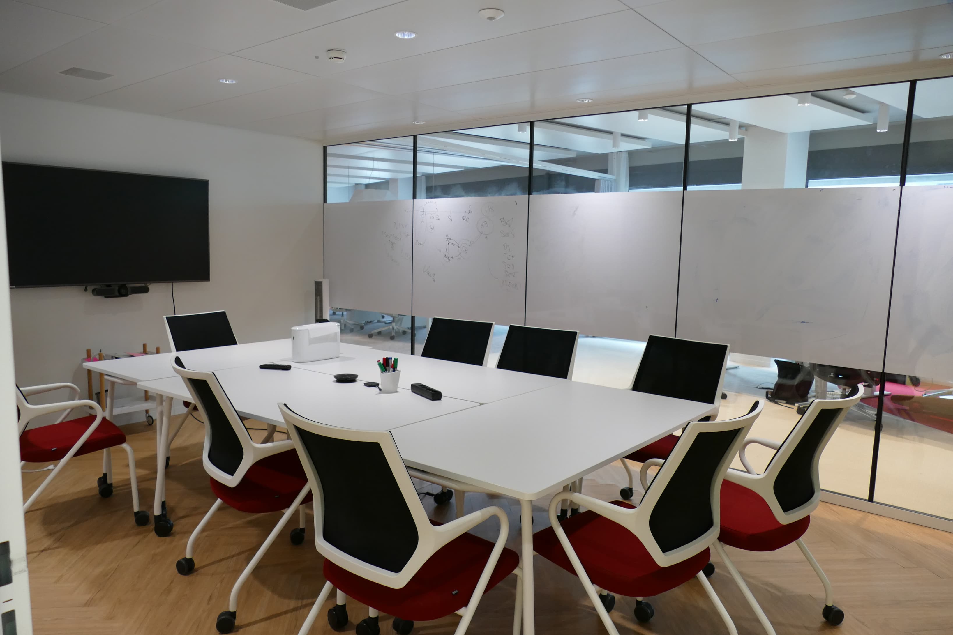 Professional meeting room equipped with presentation facilities and whiteboards. Can accommodate up to 12 people.