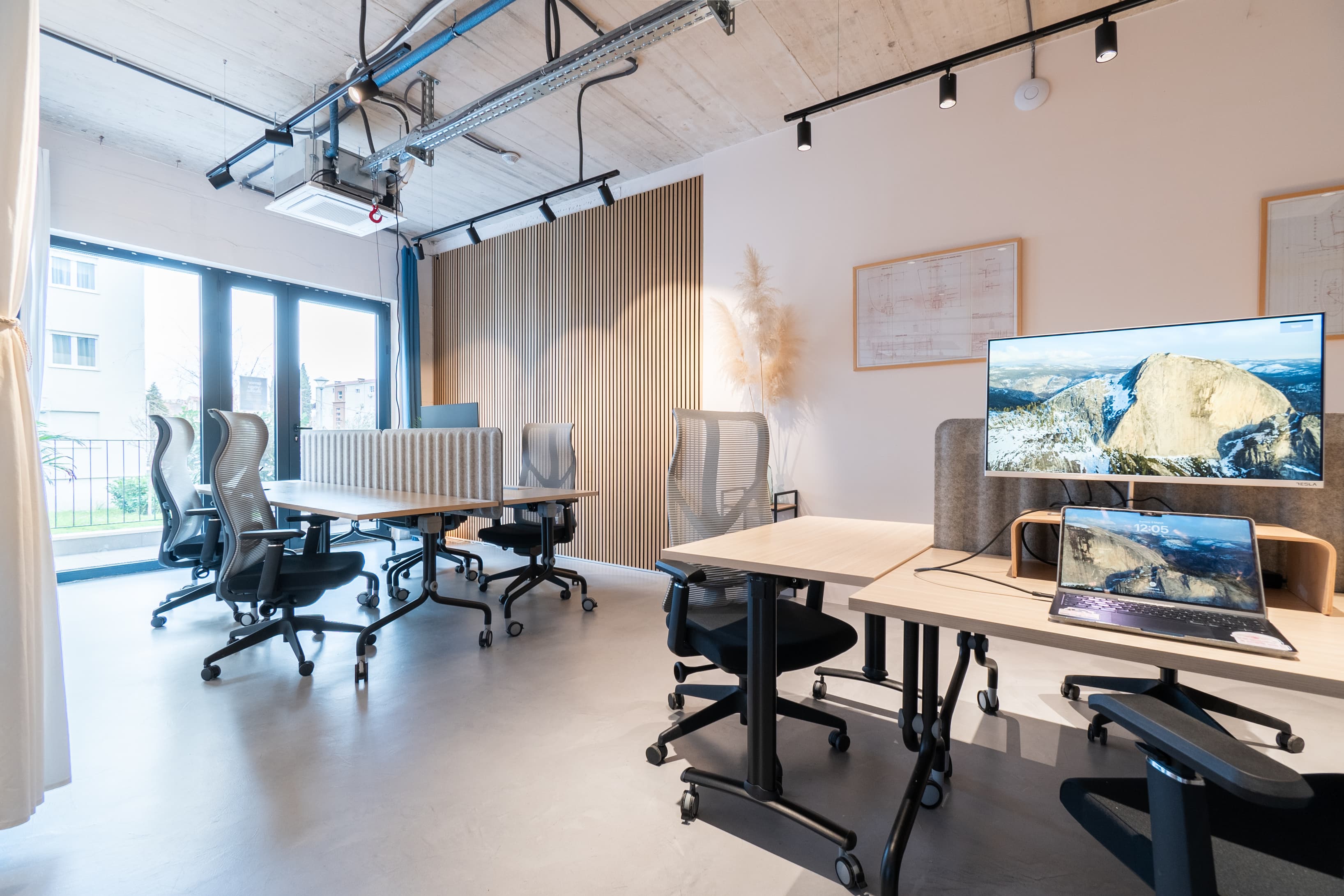 Collaborative open office layout designed to boost productivity and networking.