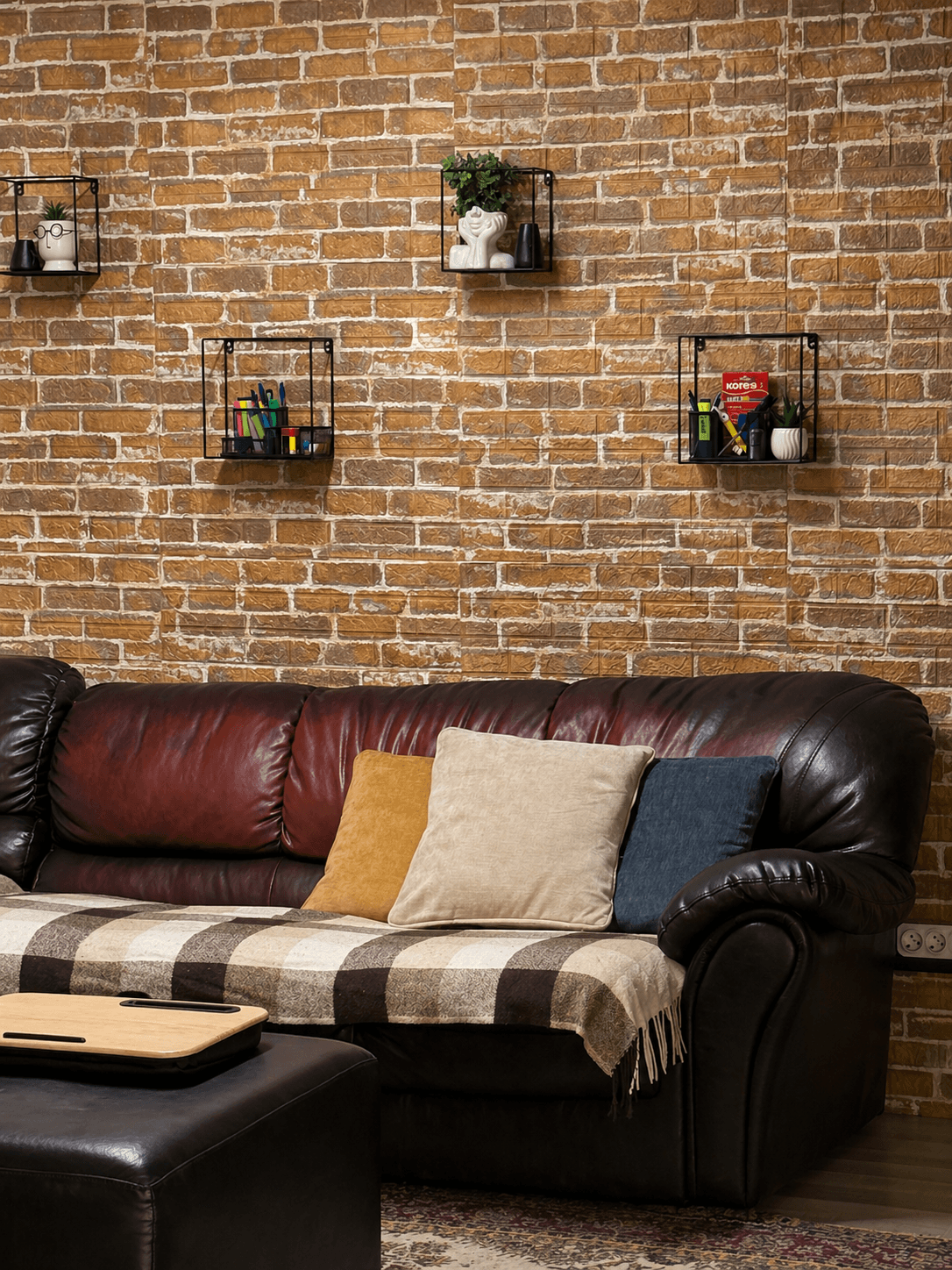 A relaxed work corner with sofa seating and a laptop stand for more comfortable, informal work sessions.
