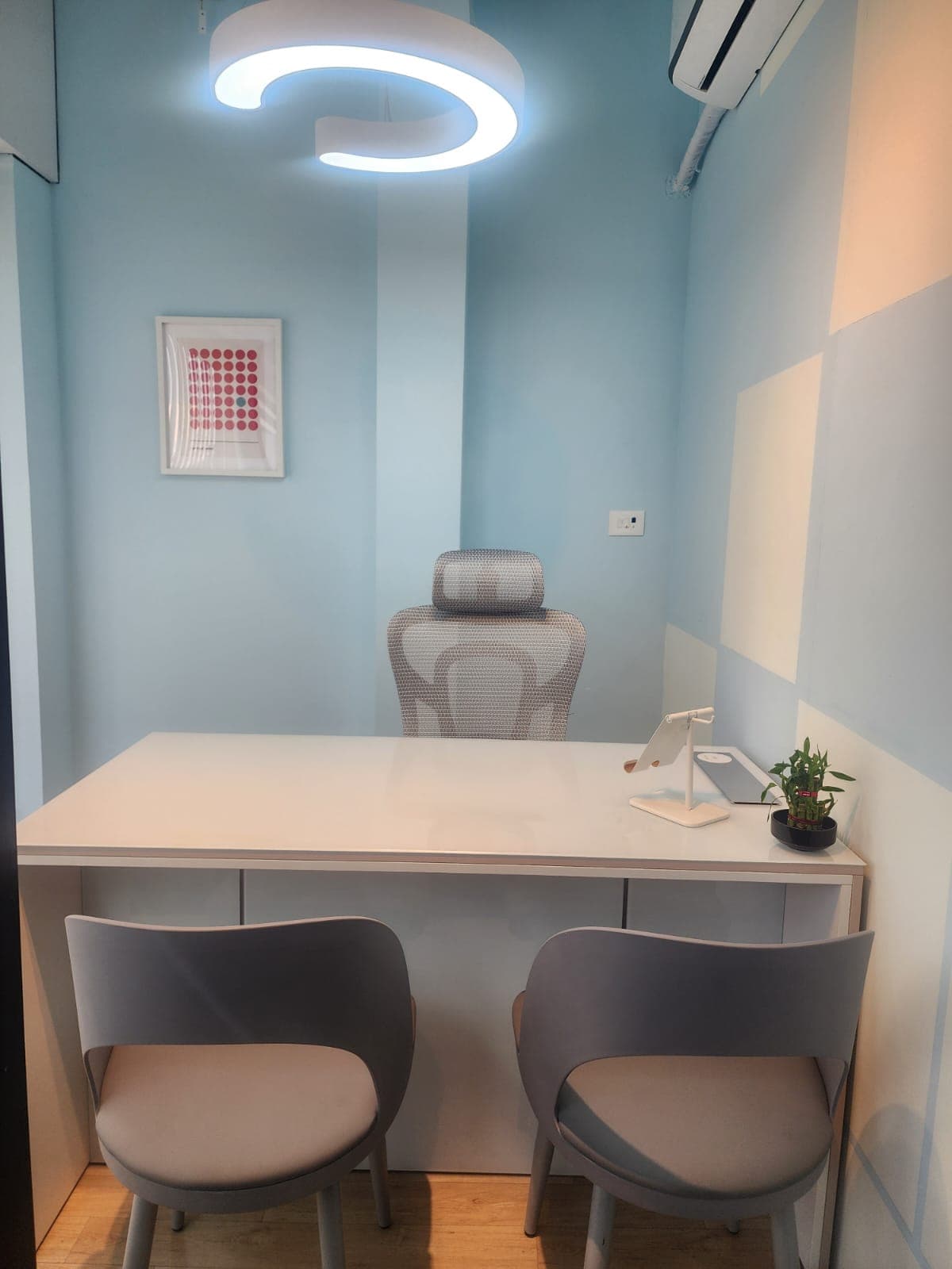 “A compact 3-seater private cabin designed for focused work and small team collaboration.”