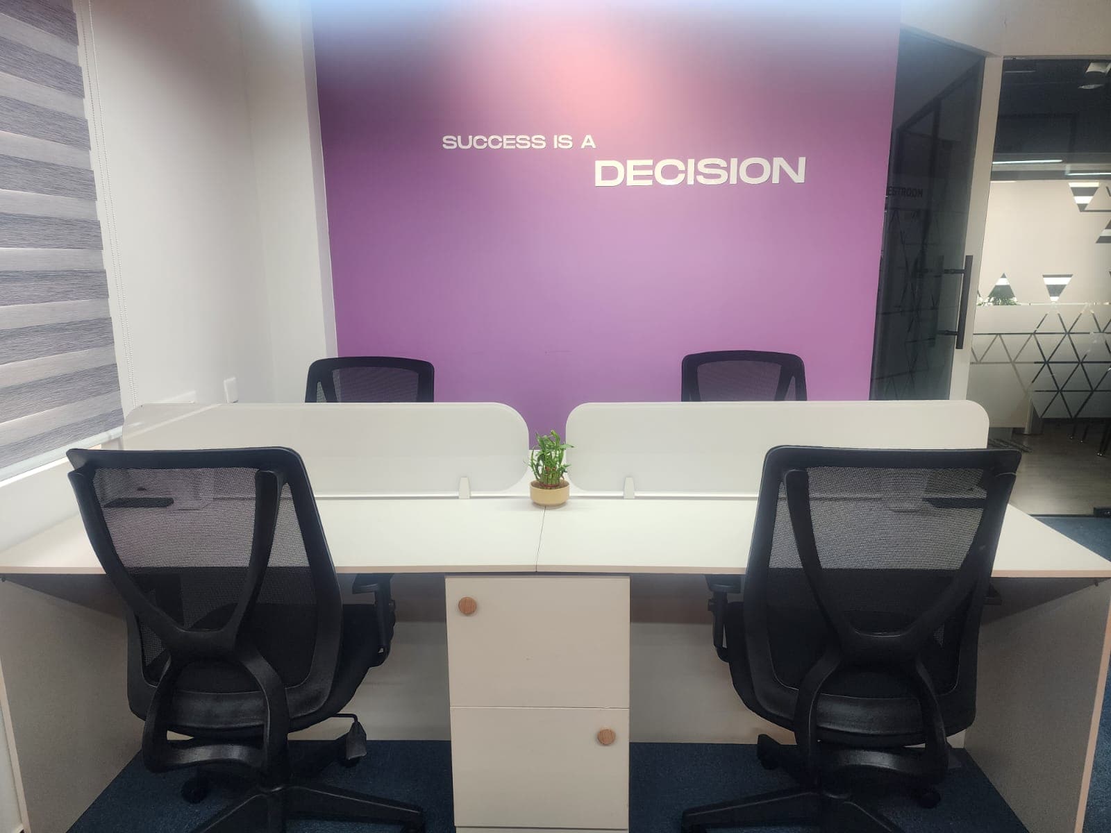 “Success is a Decision is a thoughtfully designed 4-seater open space cabin that encourages collaboration, creativity, and a 