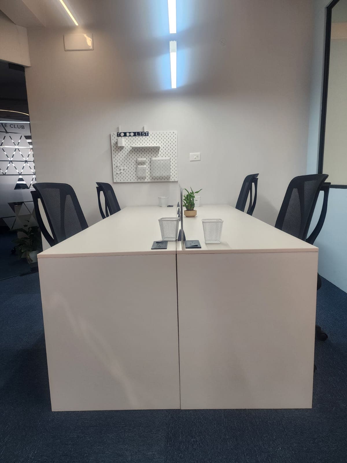 “Hustle – a vibrant 4-seater workspace built to inspire focus, drive, and team success.”