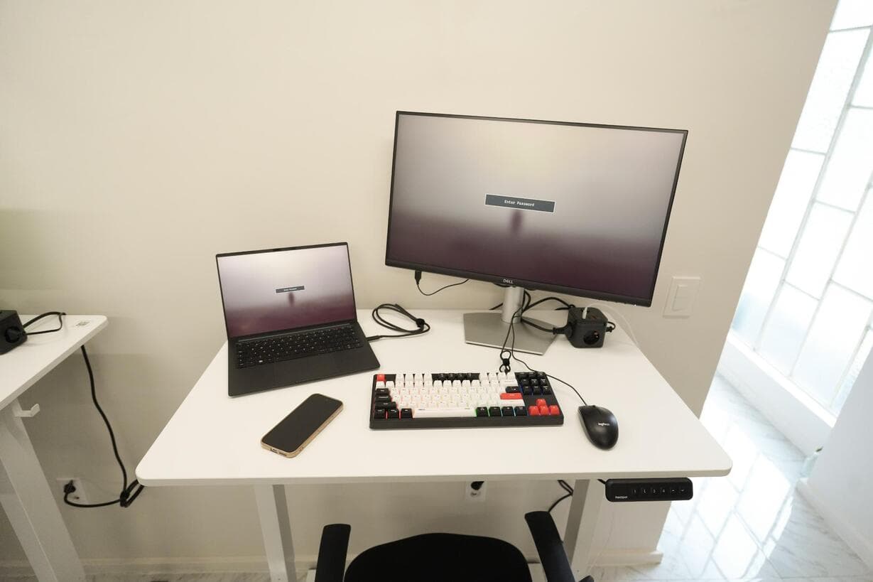 Adjustable desk with monitor for focused work Adjustable desk with monitor for focused work