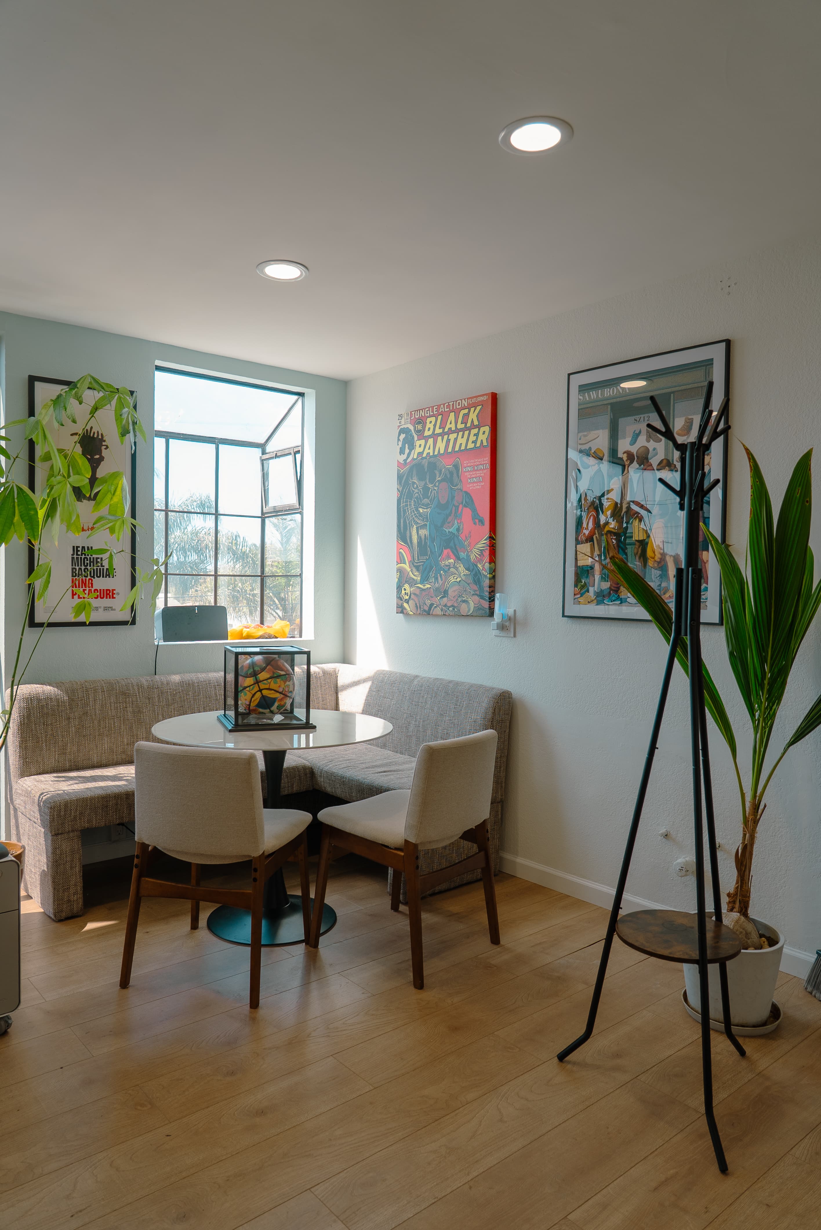 Bright and open co-working area with natural light, comfortable seating, and a clean, modern layout designed for productivity