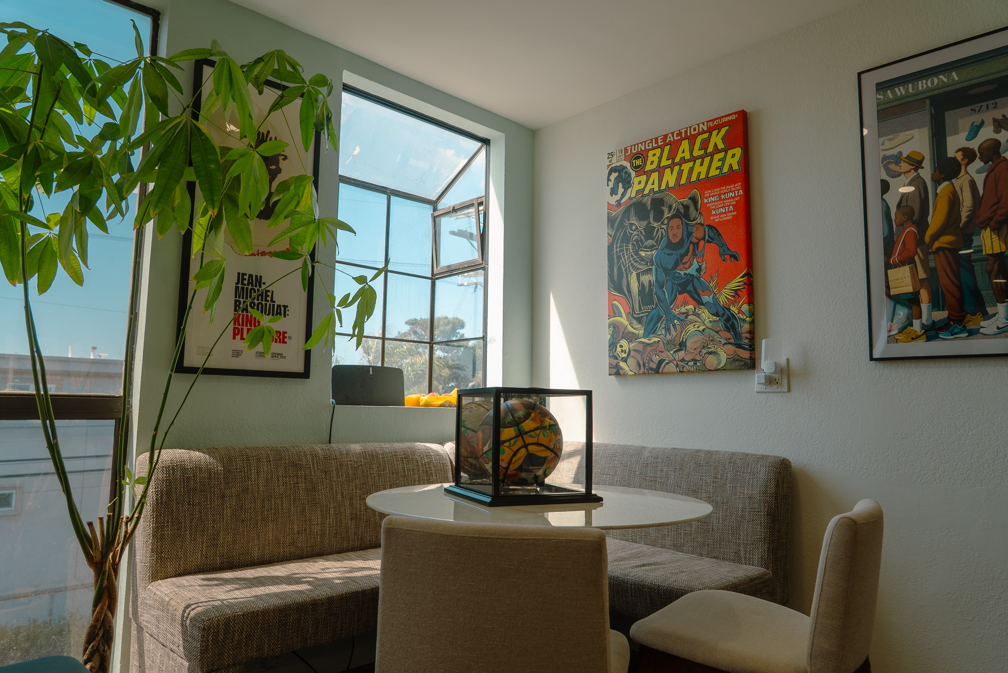 Bright and open co-working area with natural light, comfortable seating, and a clean, modern layout designed for productivity
