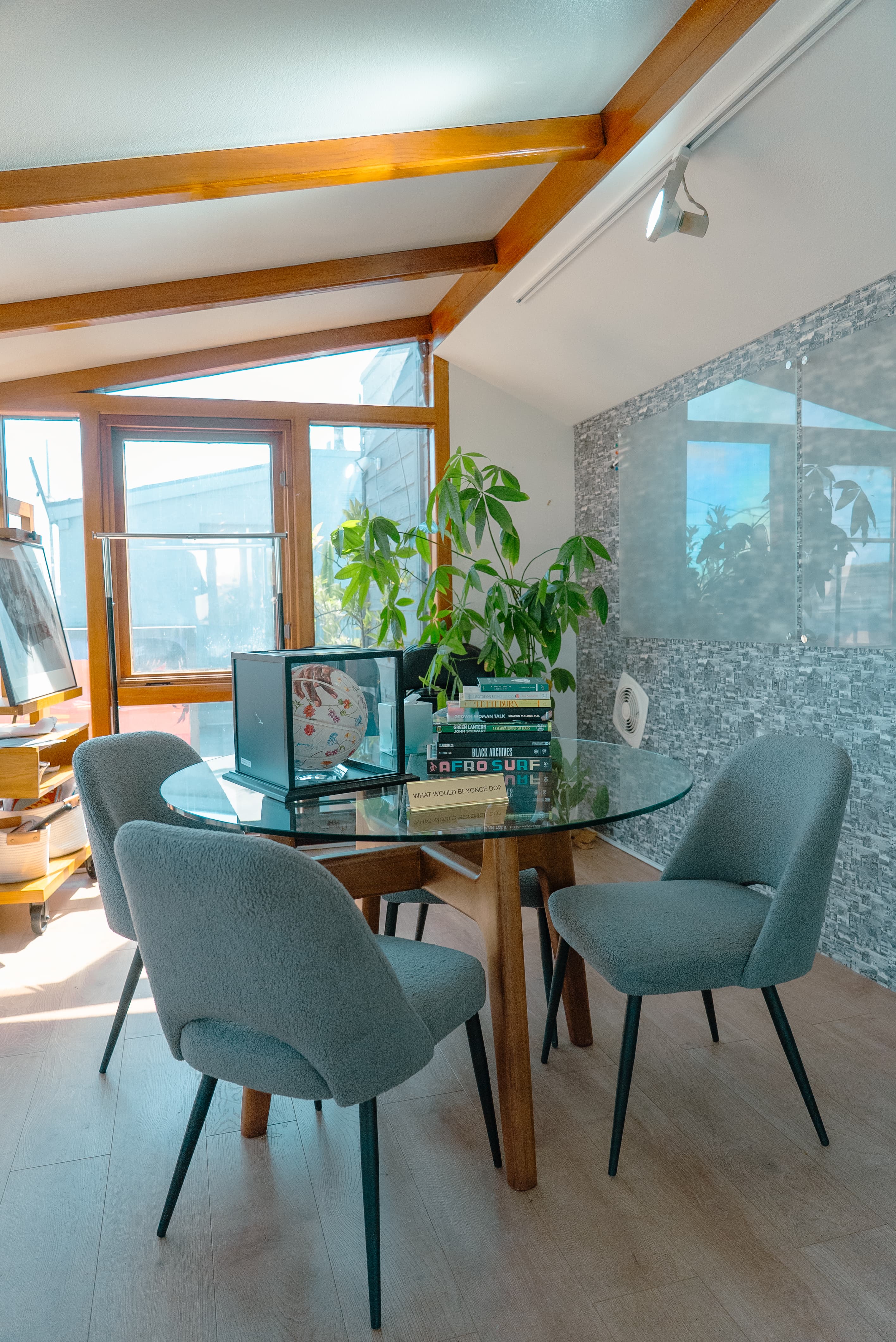 Bright and open co-working area with natural light, comfortable seating, and a clean, modern layout designed for productivity