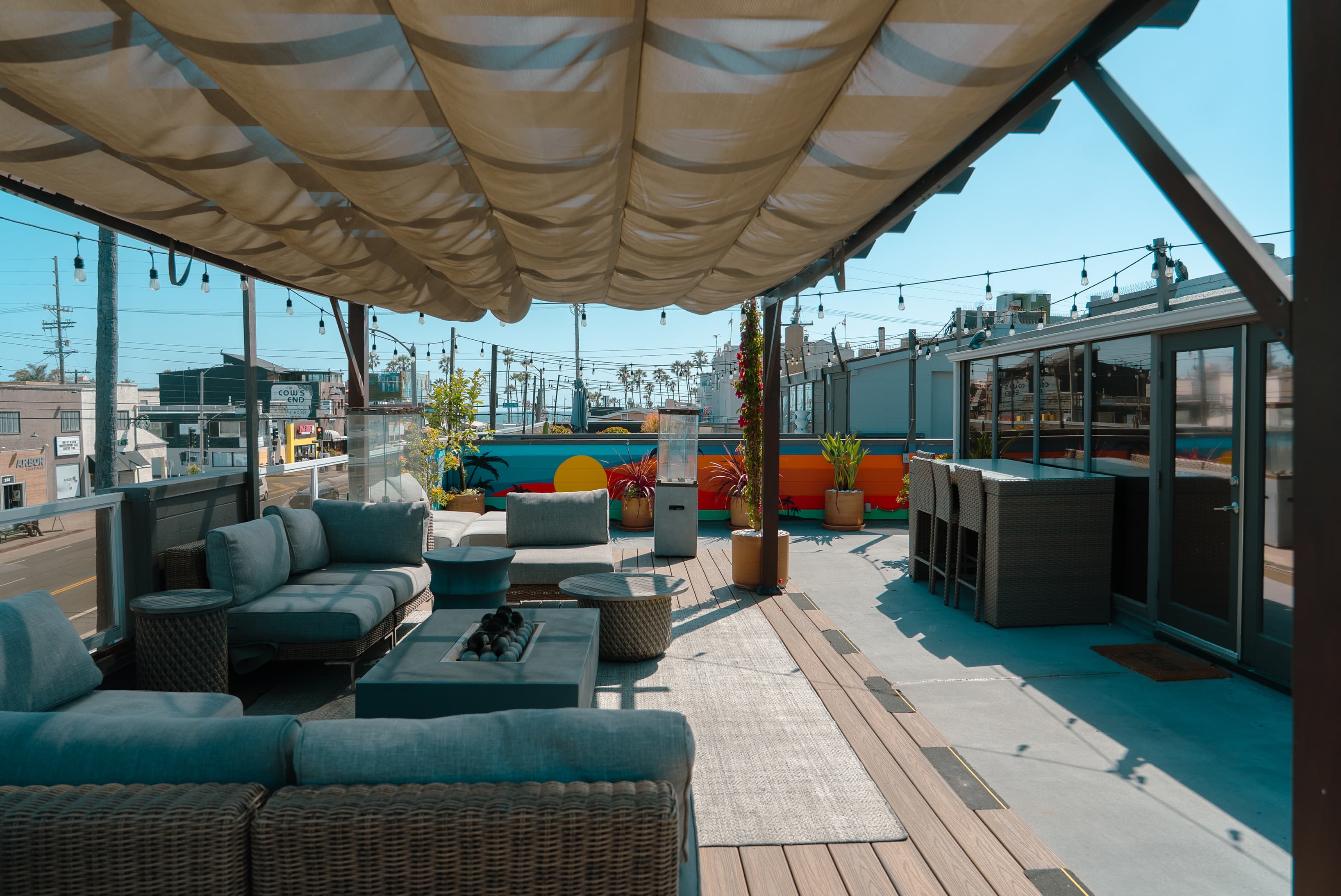 Relaxing outdoor space with a fresh, airy atmosphere, perfect for breaks, casual meetings, or small gatherings.