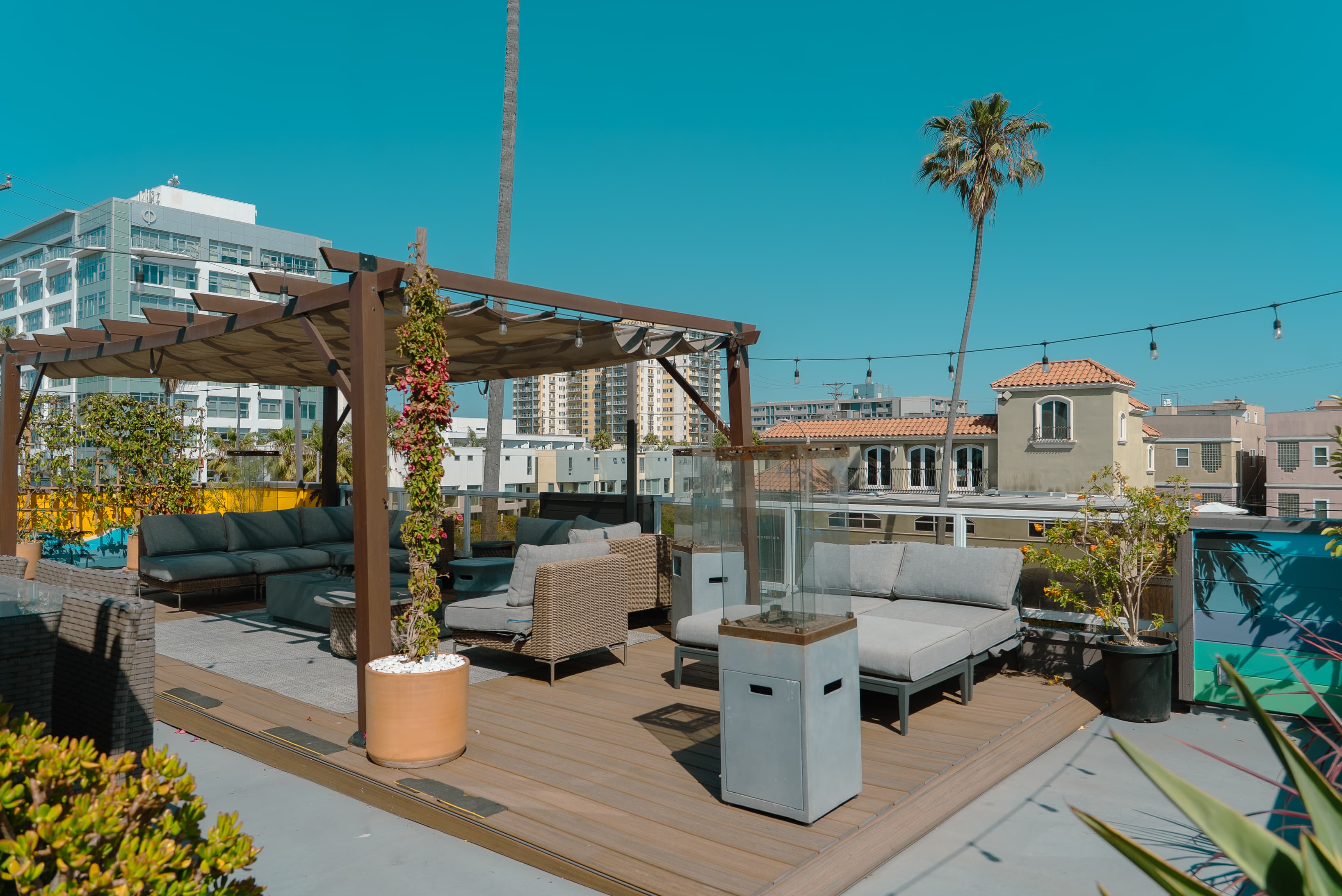 Relaxing outdoor space with a fresh, airy atmosphere, perfect for breaks, casual meetings, or small gatherings.