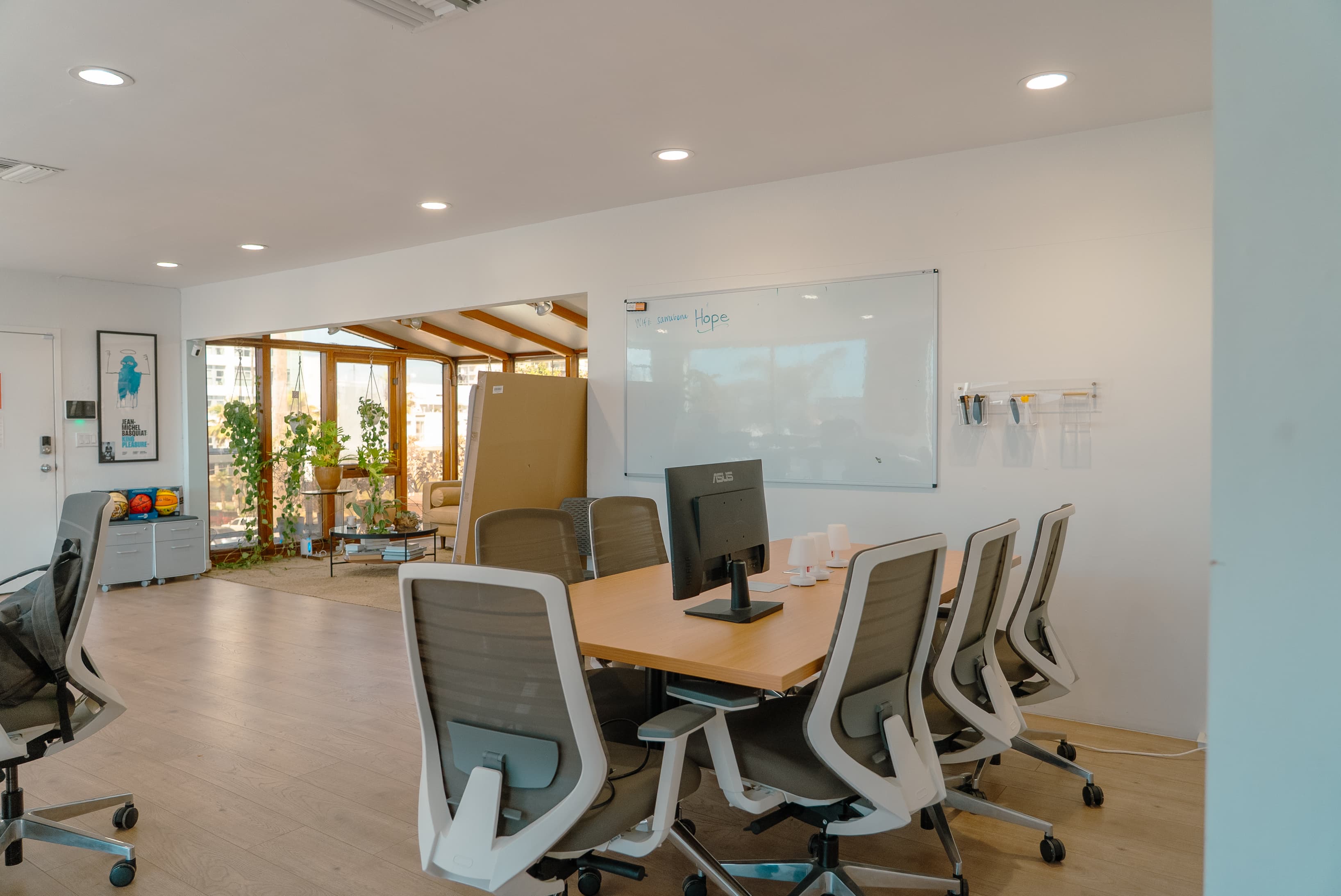 People engaging in work, collaboration, or events, highlighting the community-driven and creative energy of the space.