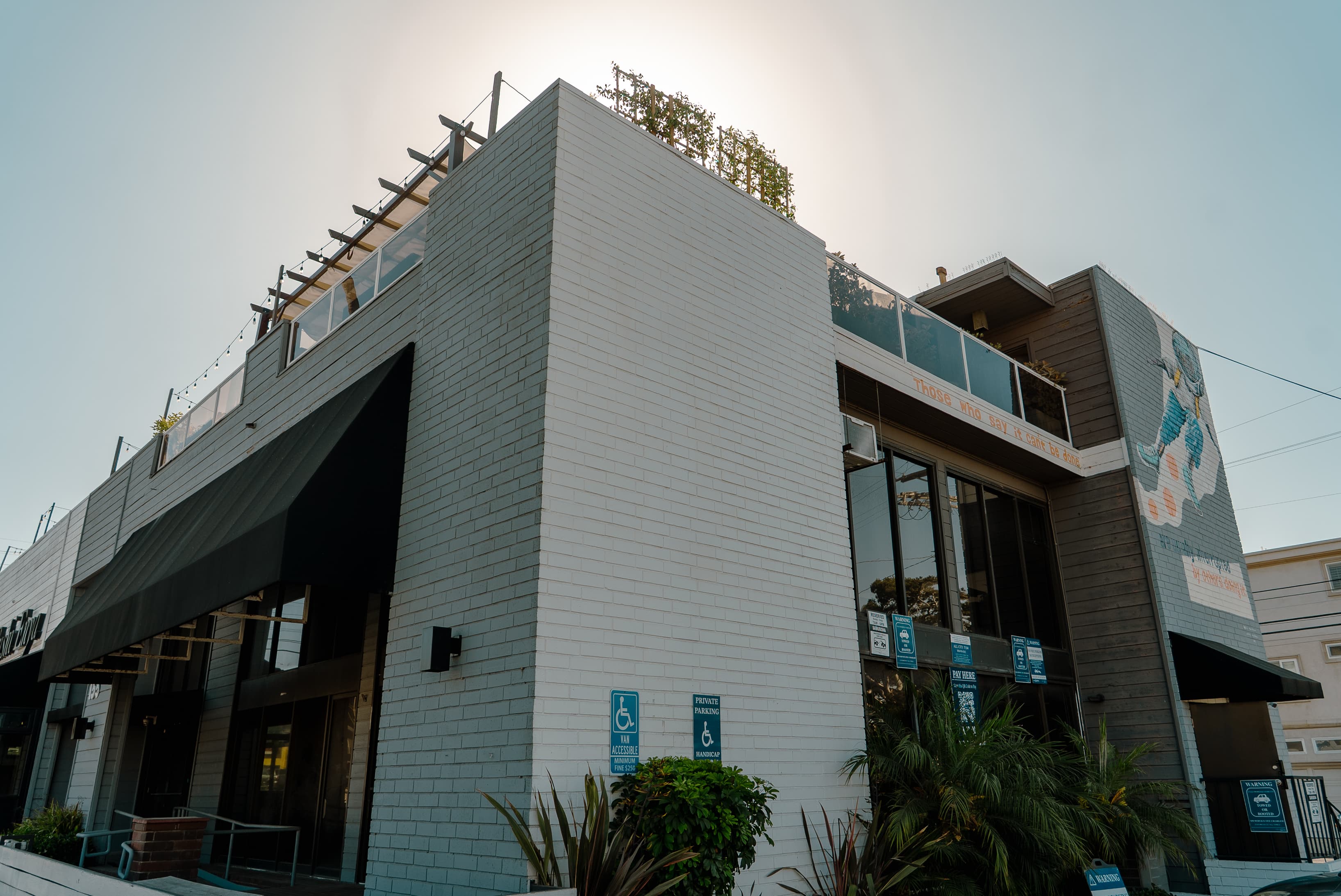 Relaxing outdoor space with a fresh, airy atmosphere, perfect for breaks, casual meetings, or small gatherings.