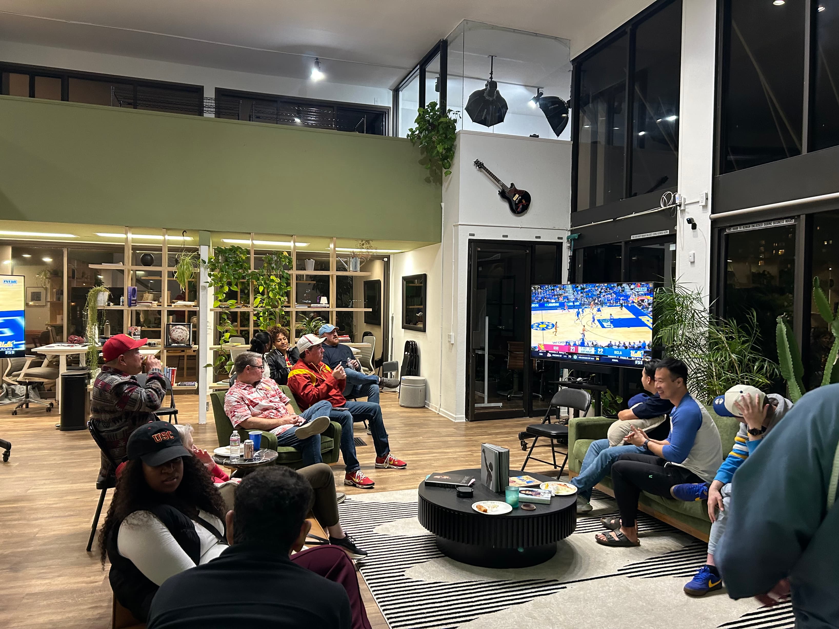 People engaging in work, collaboration, or events, highlighting the community-driven and creative energy of the space.