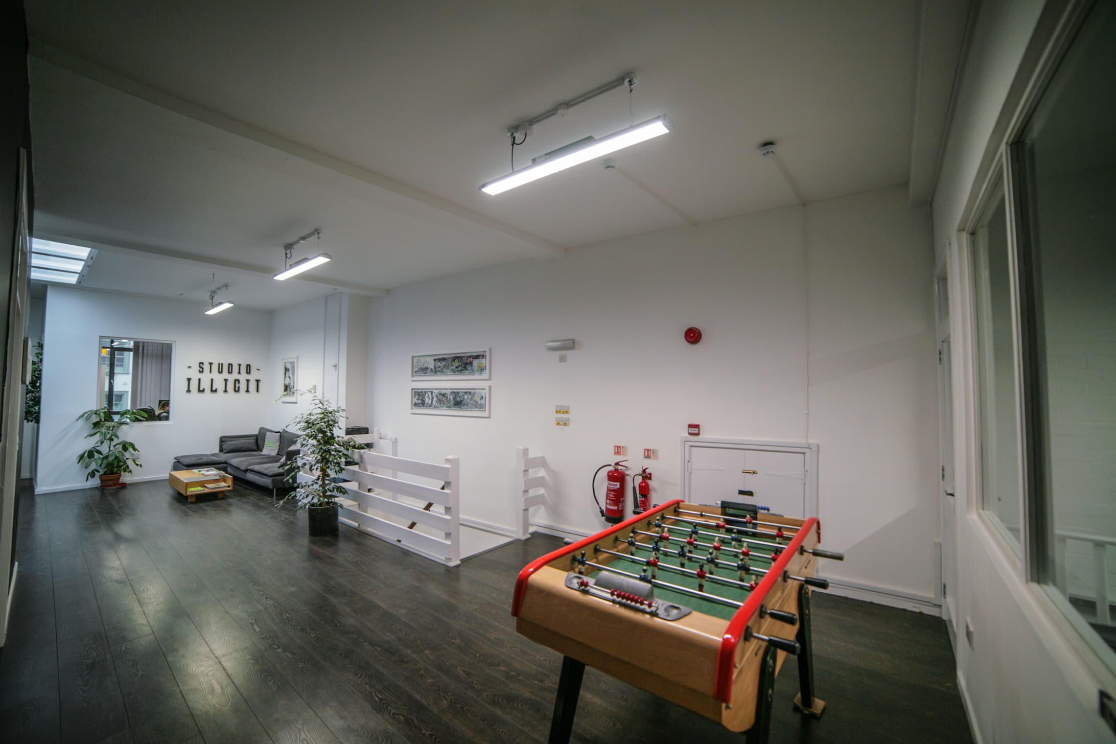 Secondary lounge area and football table Secondary lounge area and football table