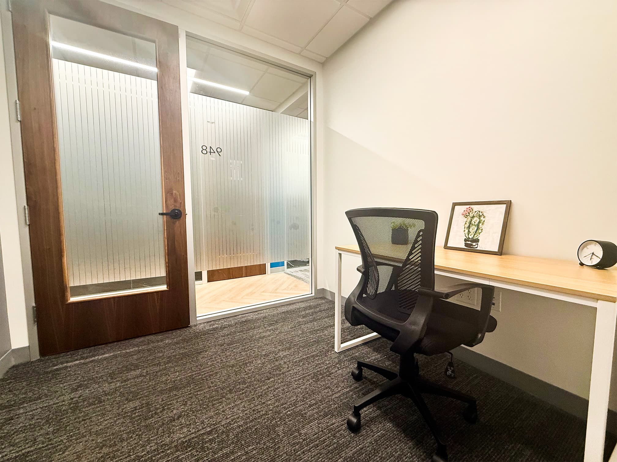 Private office featuring modern furnishings for a clean, focused workspace. Private office featuring modern furnishings for a clean, focused workspace.