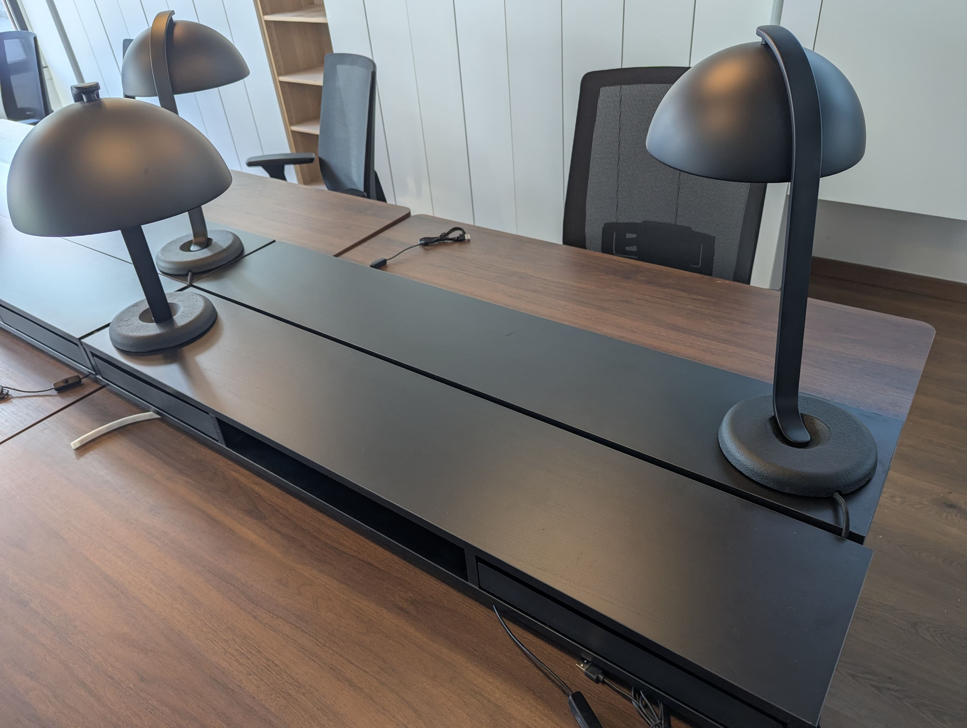 Ergonomic chairs with wheels and screen elevators with storage on every desk Ergonomic chairs with wheels and screen elevators with storage on every desk