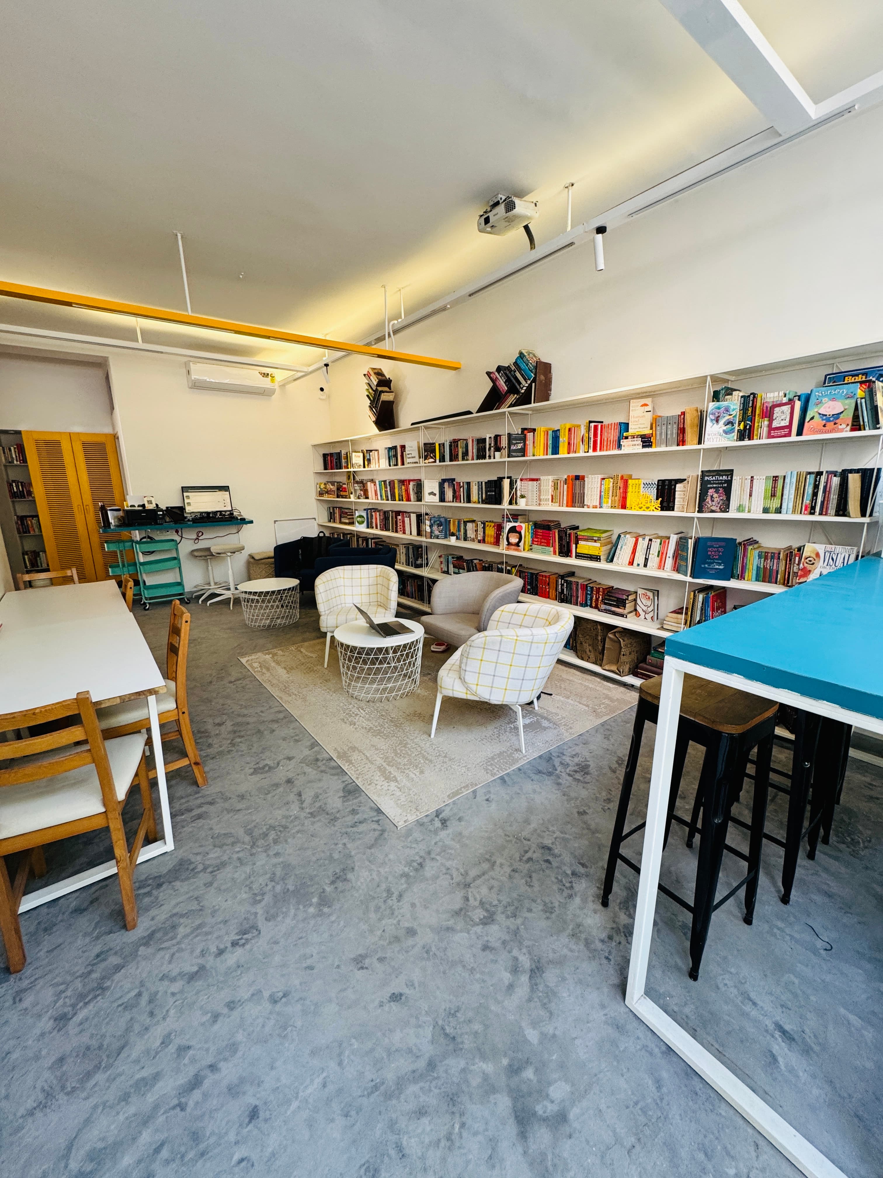 Lounge + Books + Standing desks. You walk in, and get a feeling of walking in your cozy library.